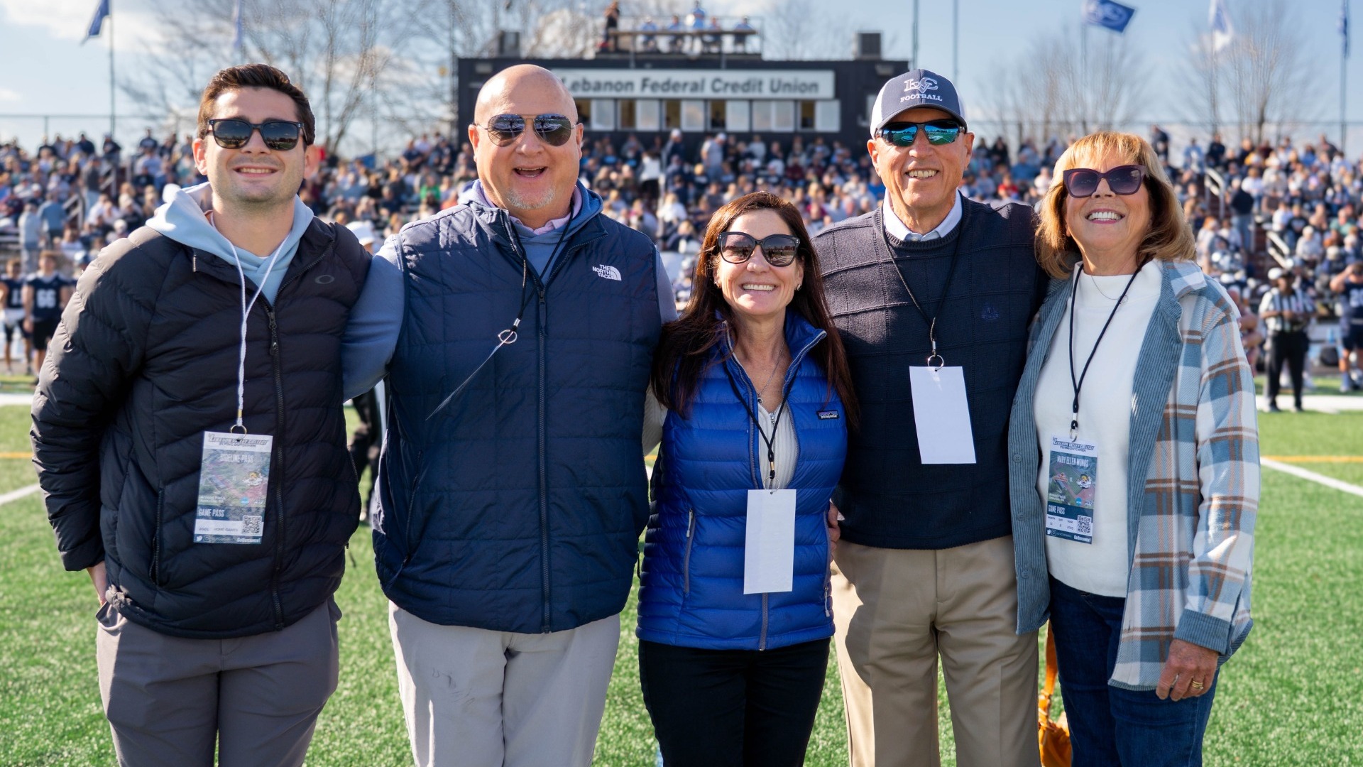 Tracey A. Smith Stover ’91 and David P. Stover ’91 being honored before a football game