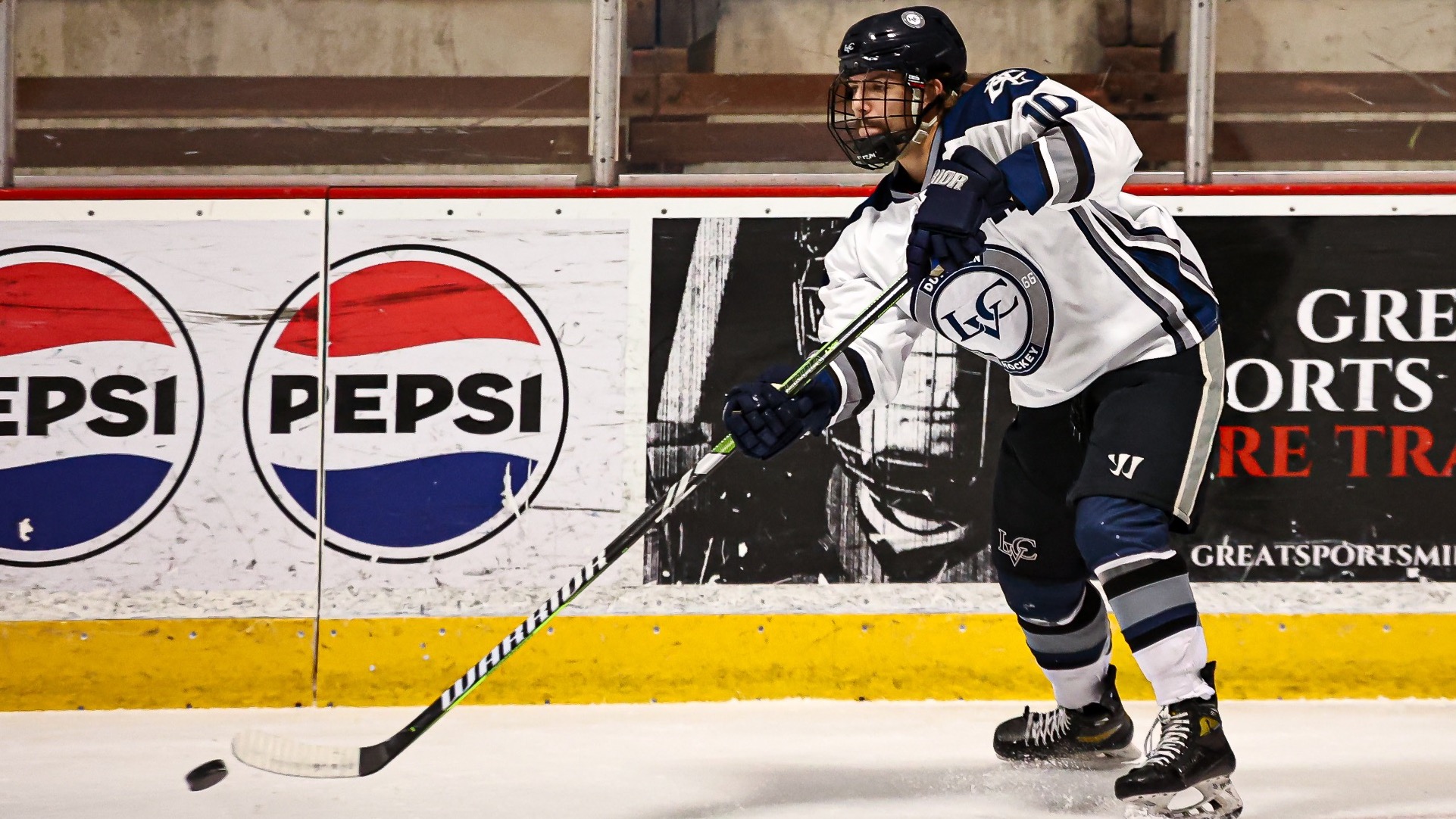 Jordan Stear passes the puck