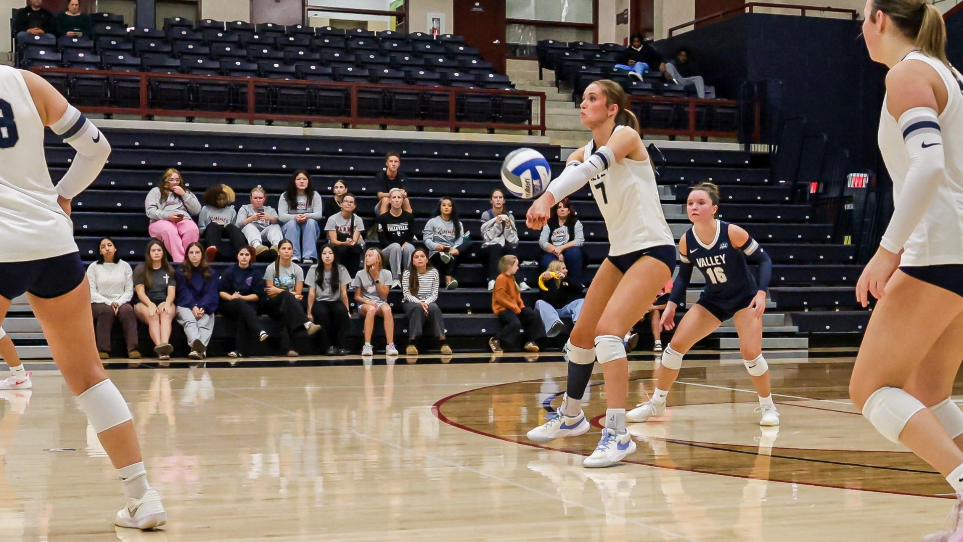 Riley Mack digging the ball