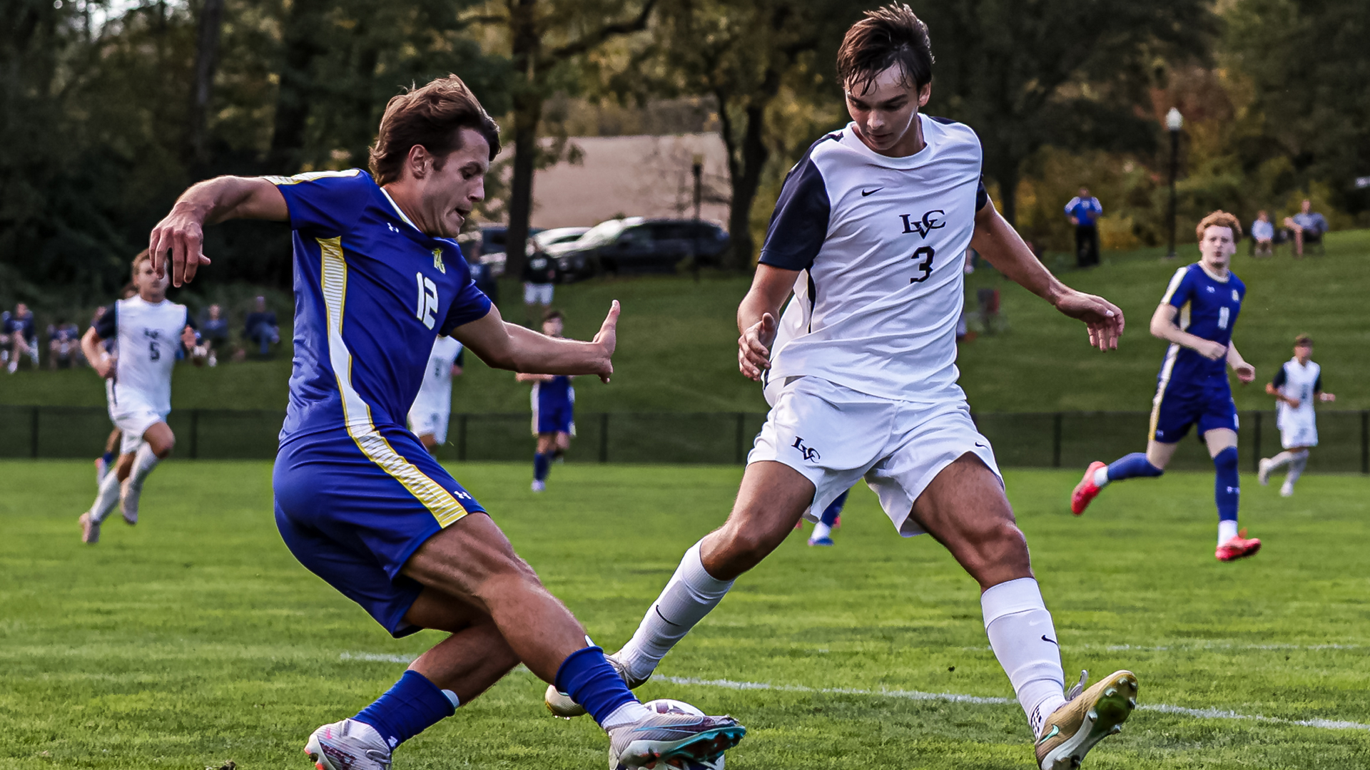 Tyler Wescott competes with a defender for the ball