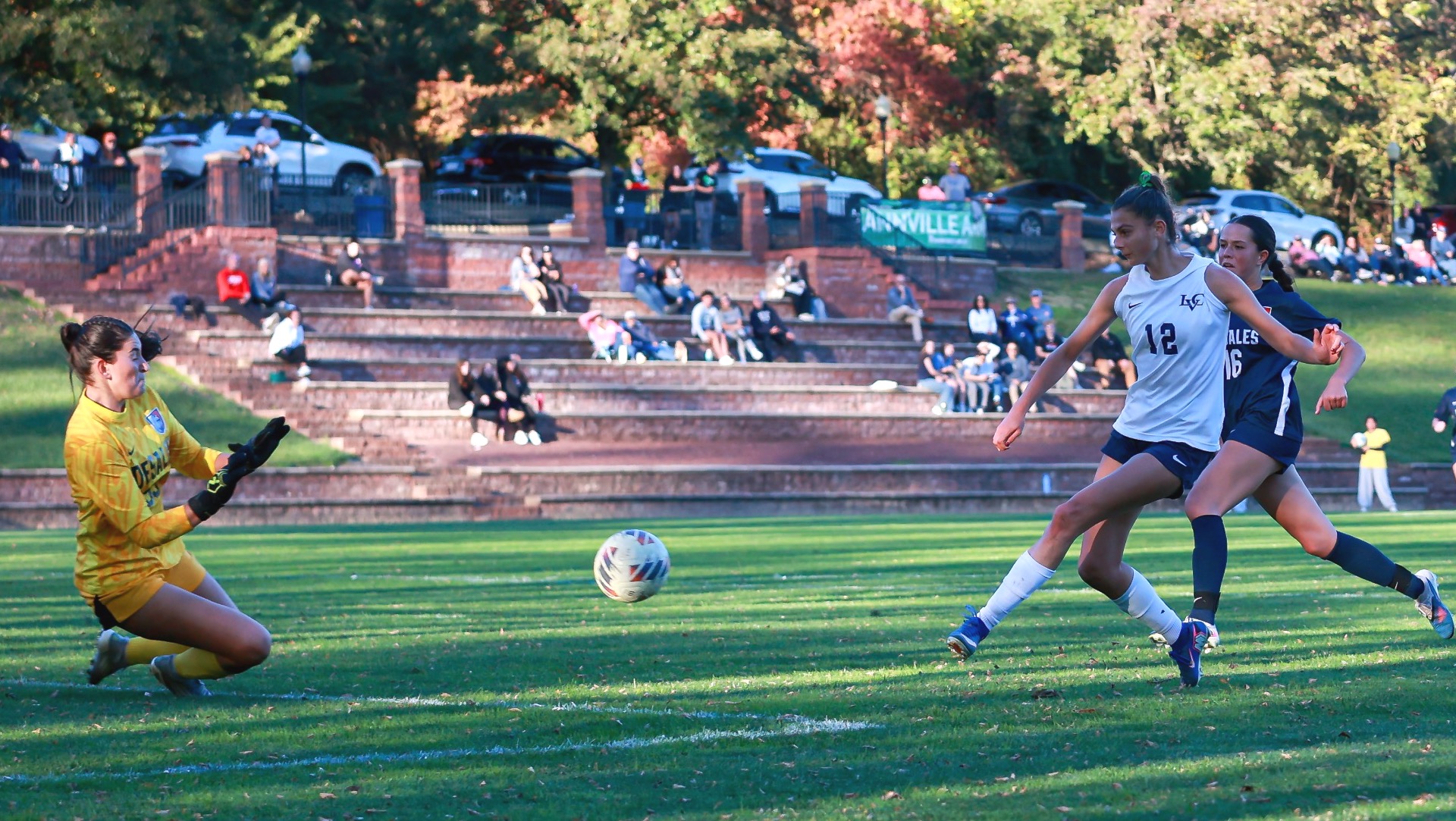 Ashlynn Newton sends the game-winning goal toward the net