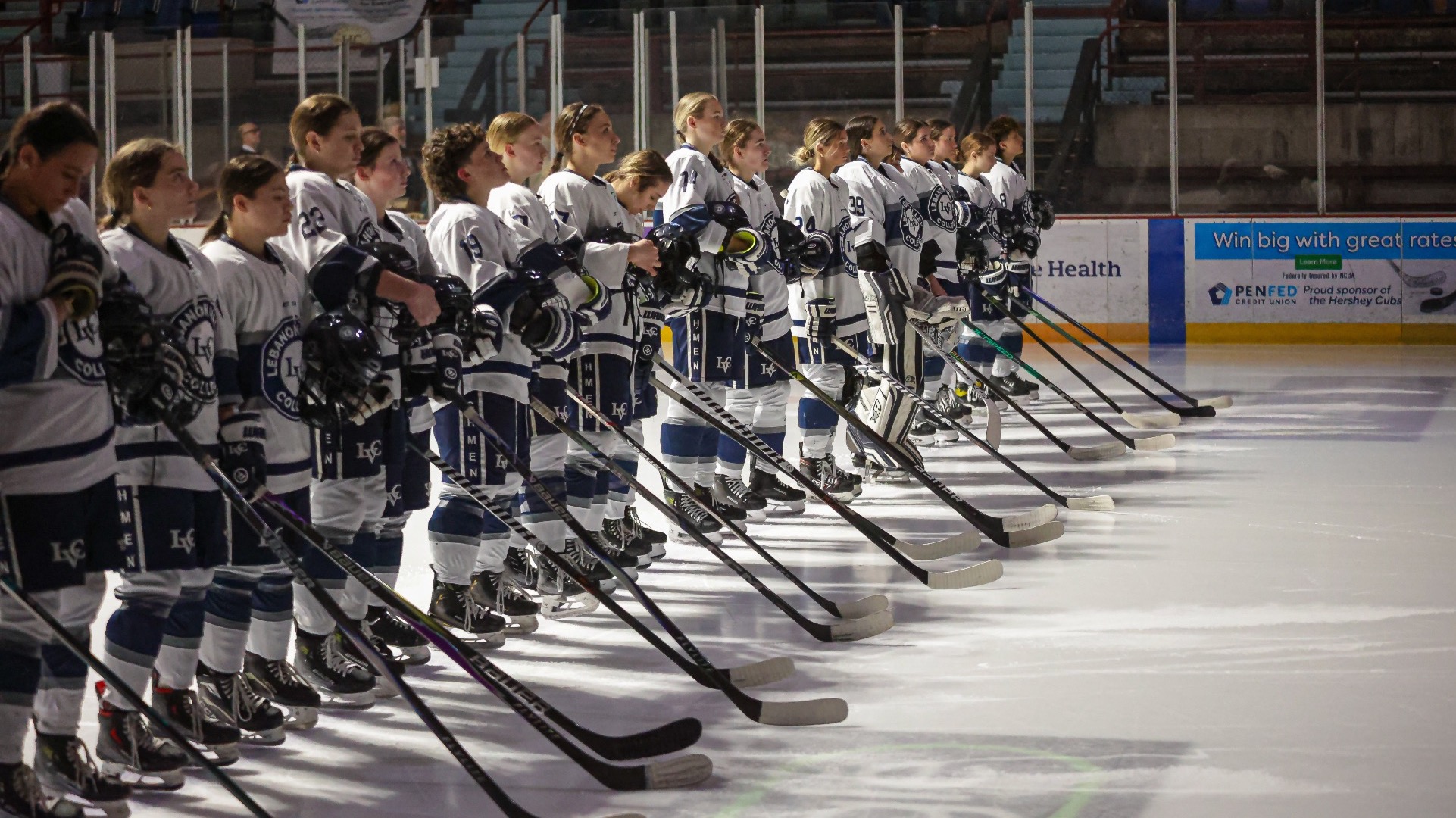 Women's Ice Hockey lined up for the National Anthem