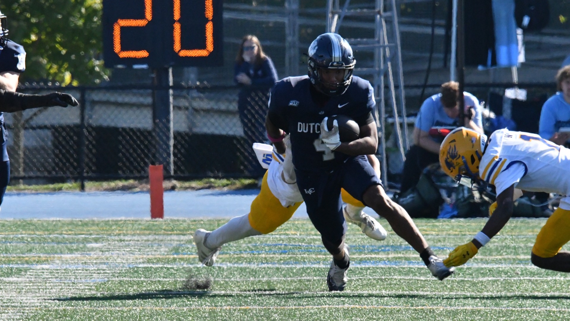 Jayden Stanfield running past defenders
