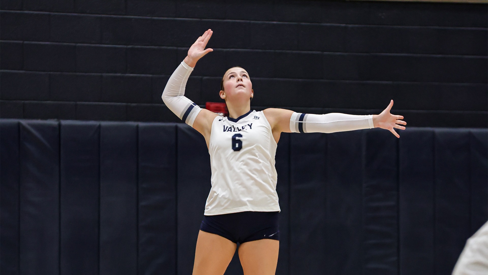 Hadley Sparks serving the ball