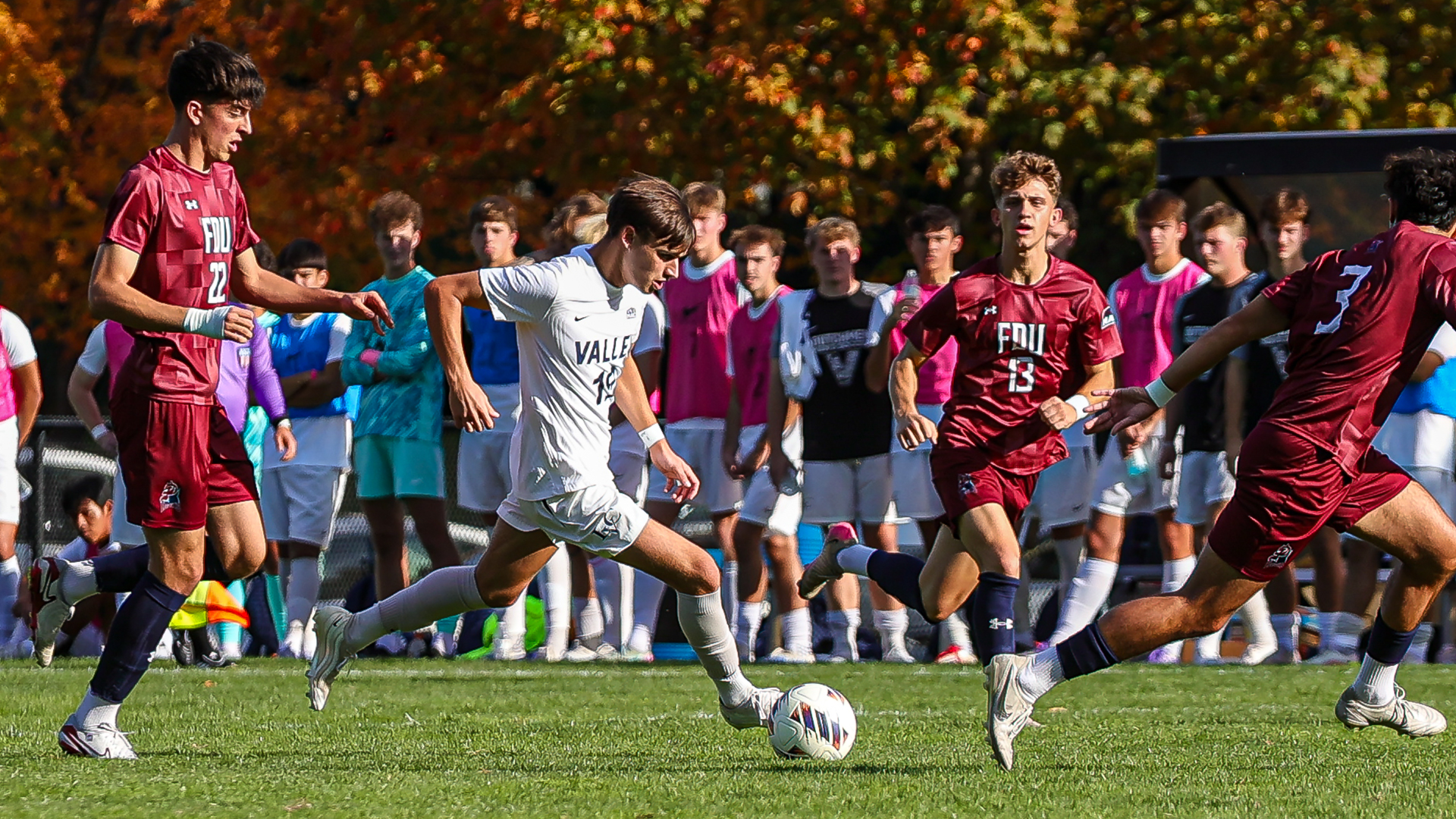Will Burton takes the ball past the defense