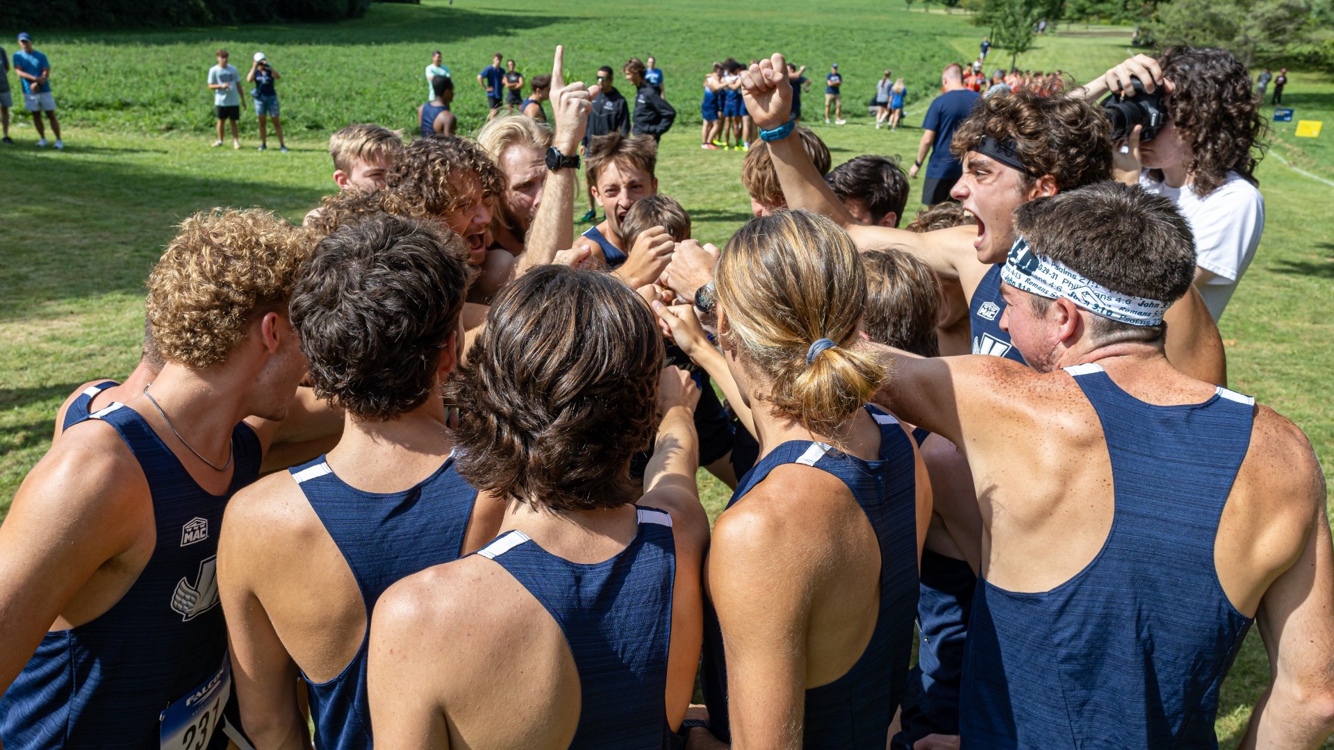 Men's Cross Country pre-race huddle