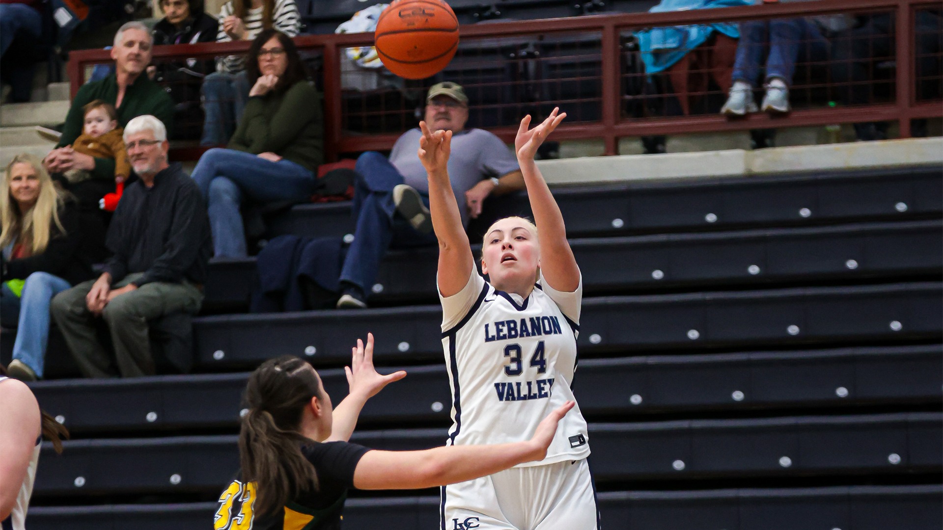 Kailey Eckhart making a three-pointer