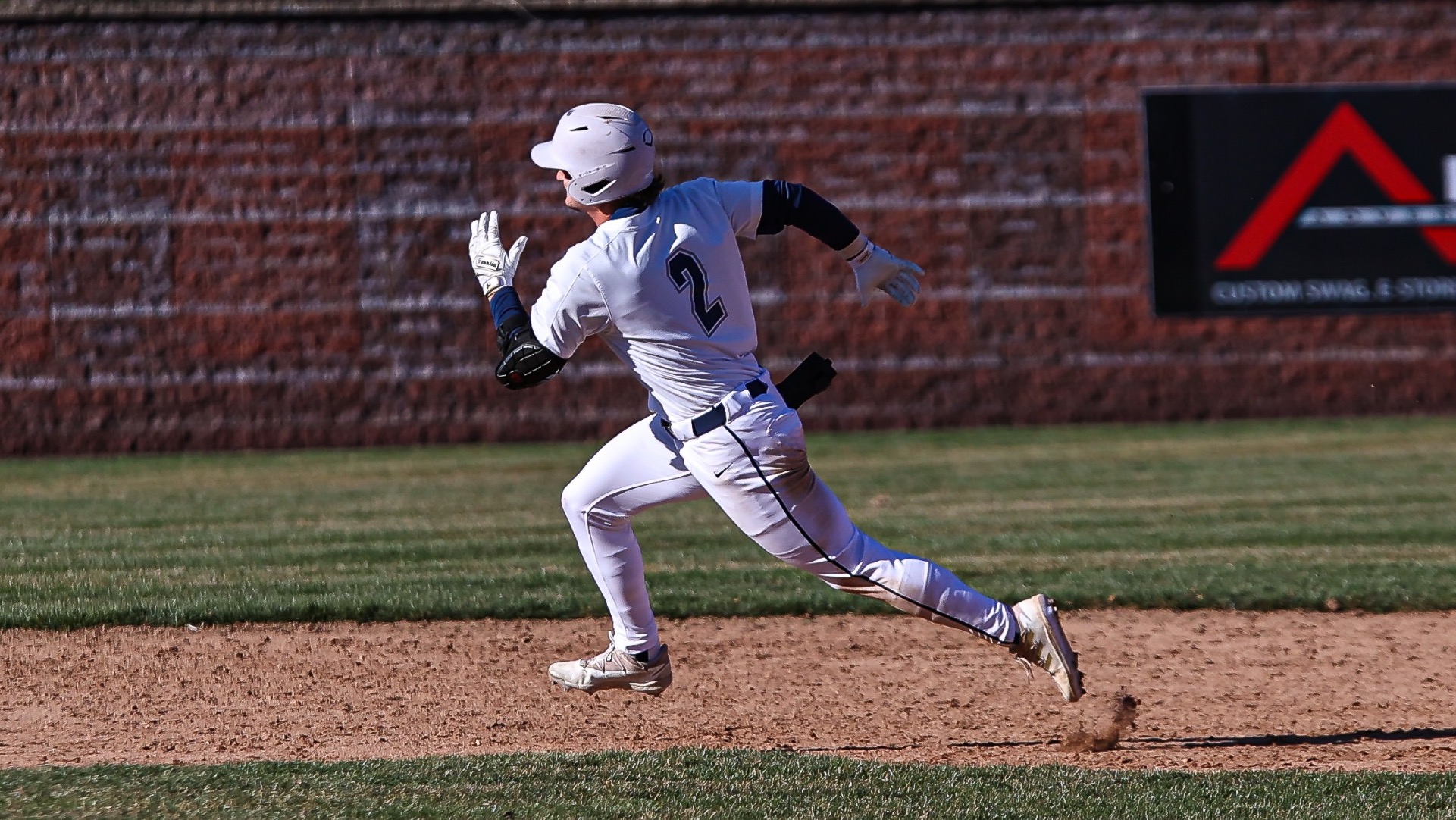 Spencer Butz hustles around the bases