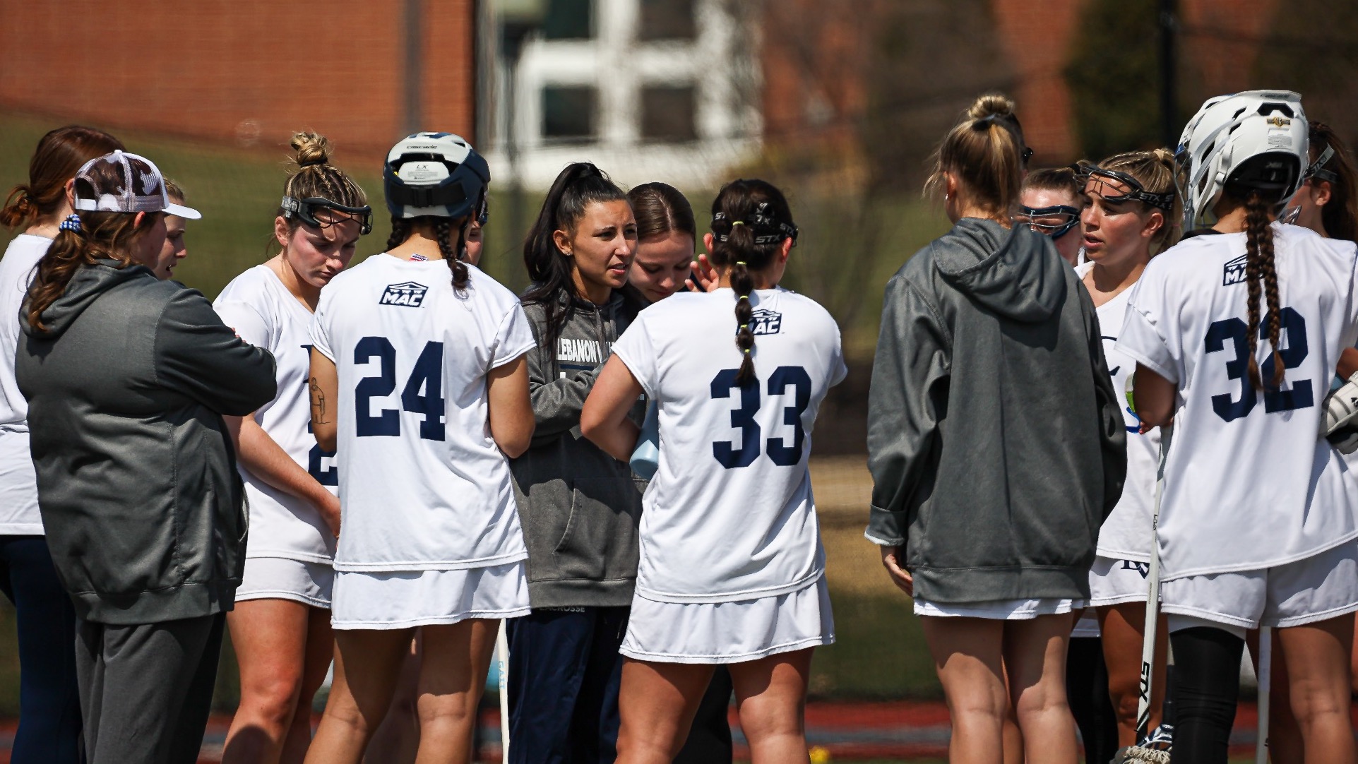 2025 women's lacrosse team huddle