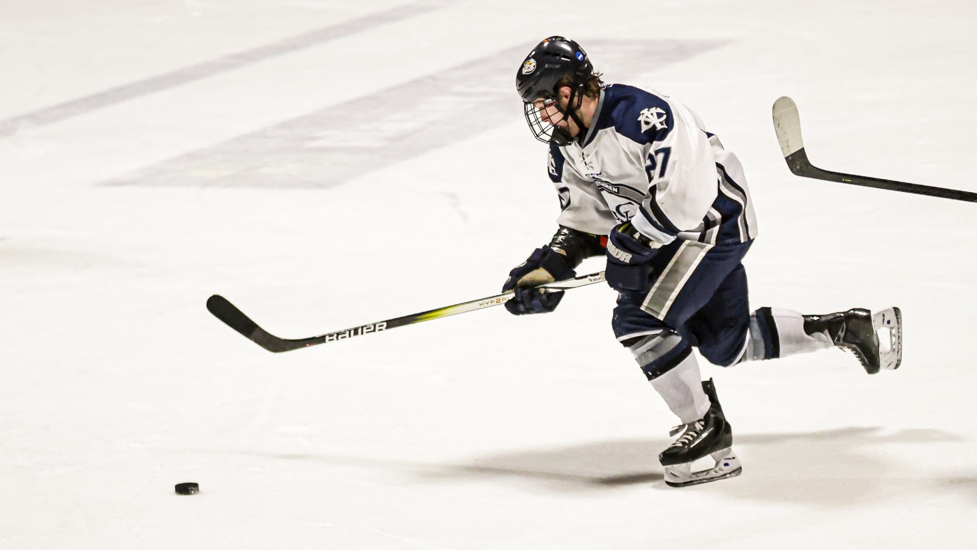 Troy Andrews takes the puck toward the net