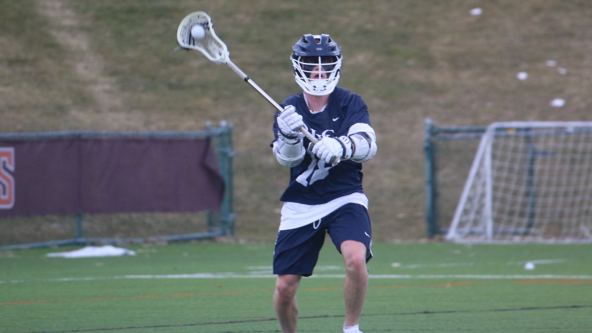 Ryan Grace throwing a pass