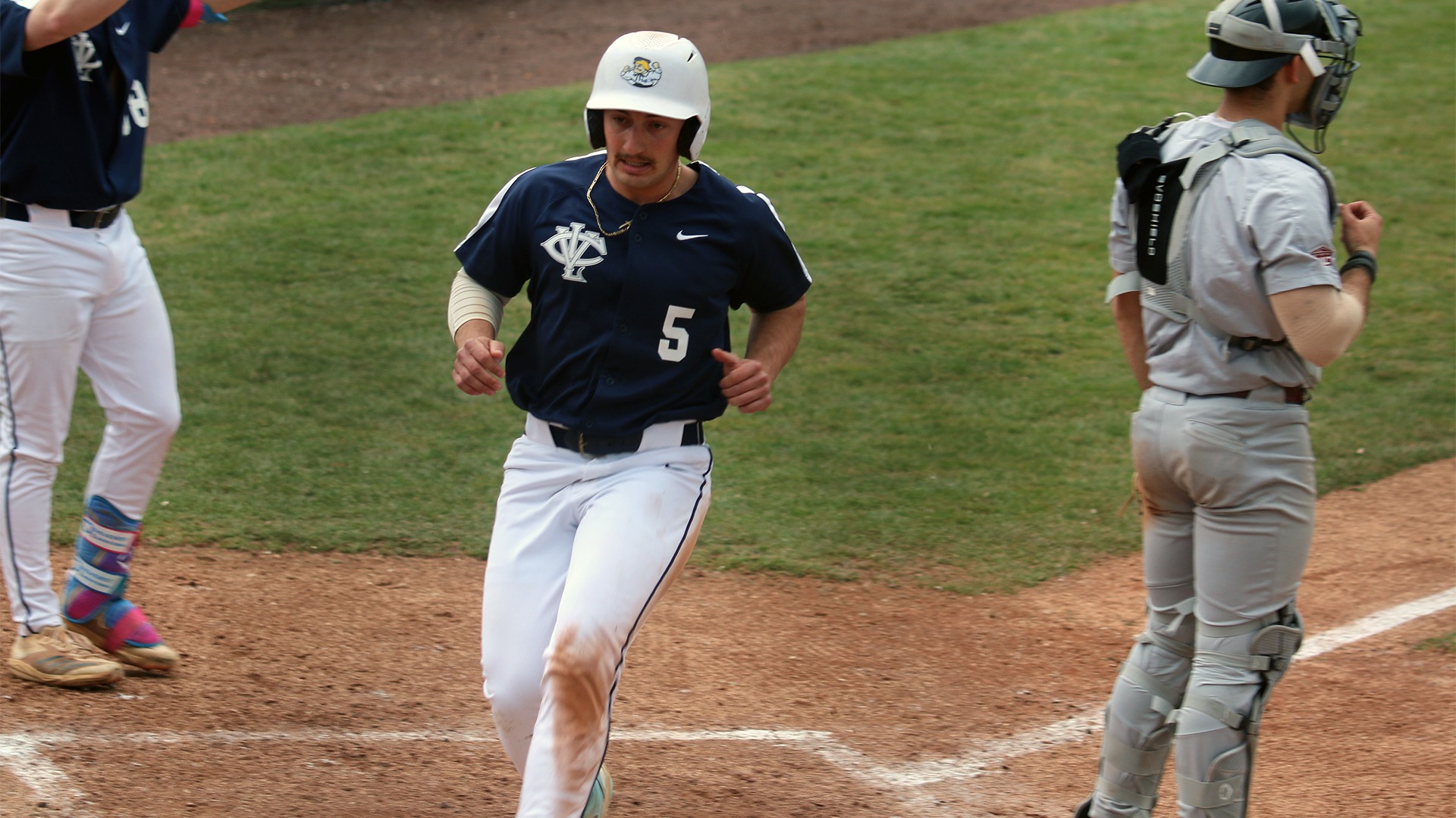 Kenny Palmieri scoring a run