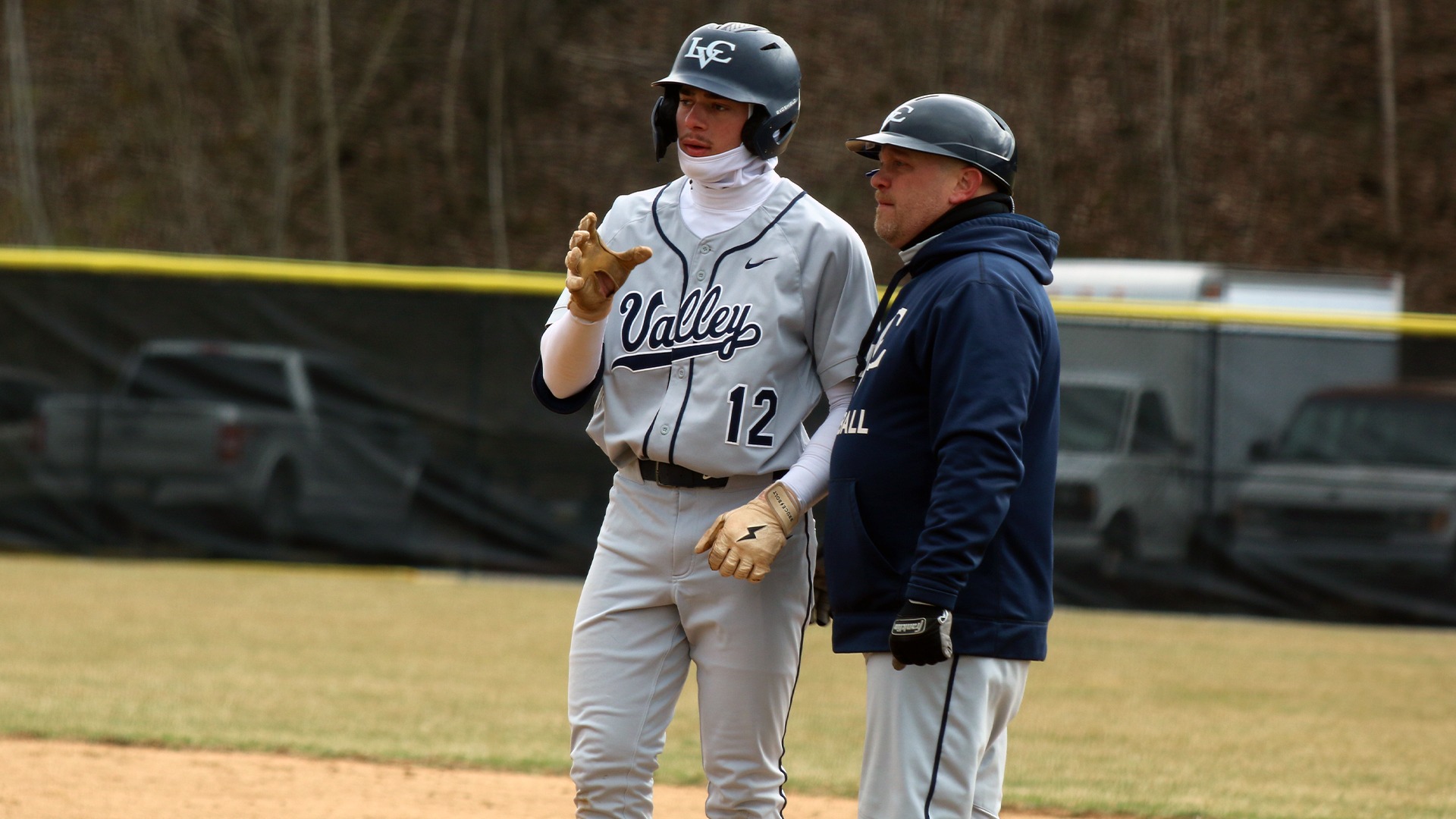 Daniel Palmieri on first base with Coach Haas