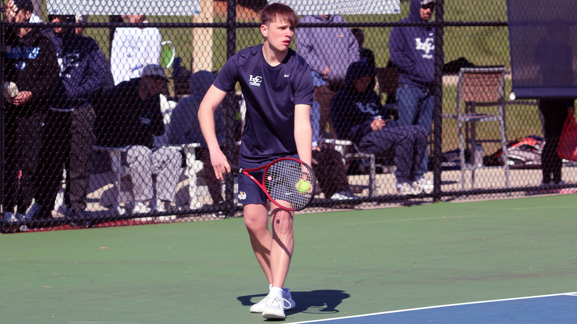 Mason Bender getting ready to serve an ace