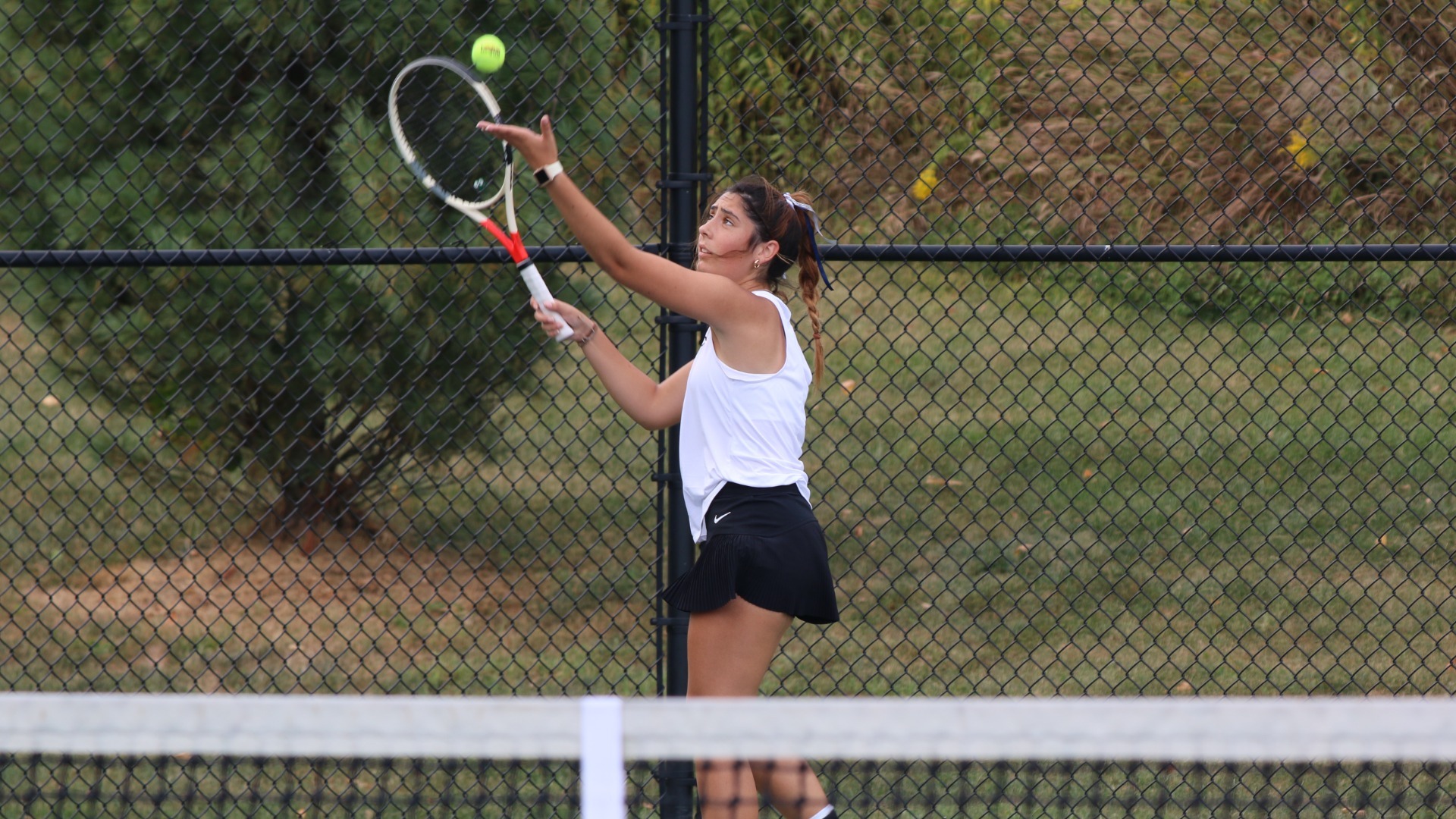 Nikki Denbowski serving