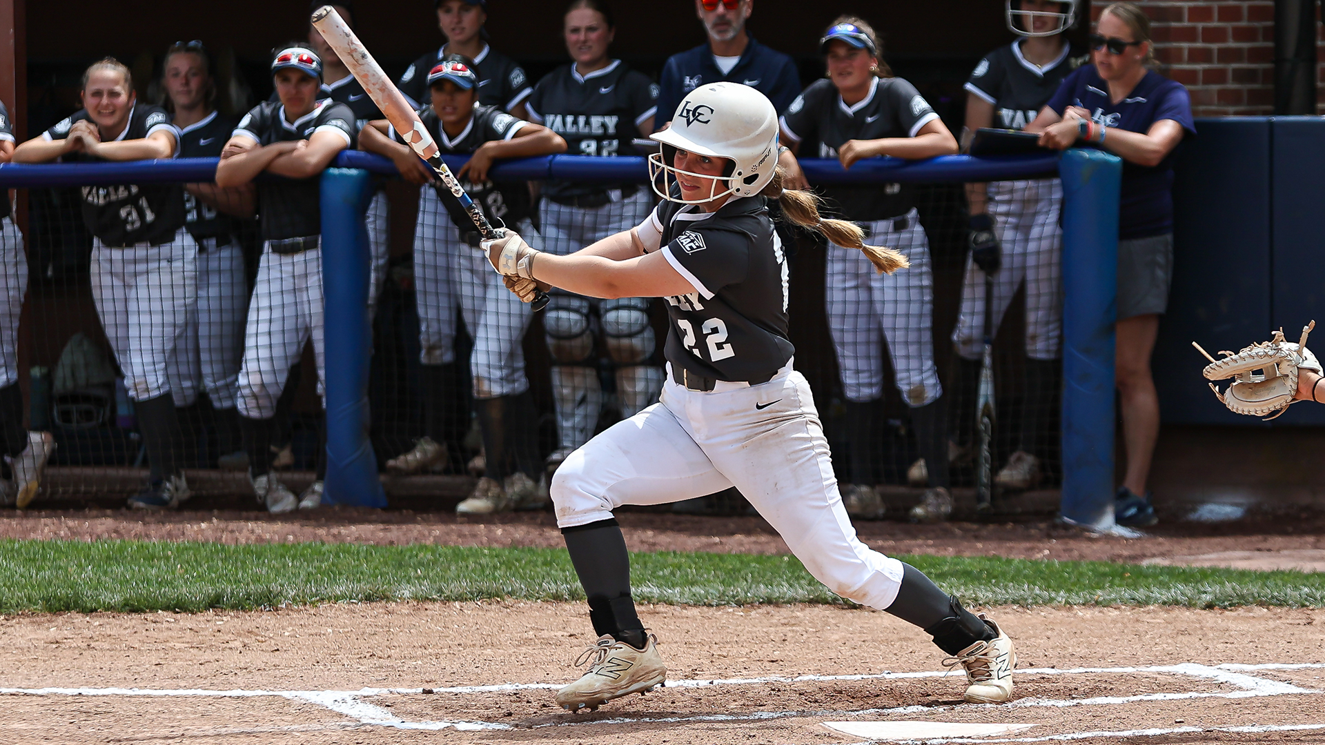 Megan Heard records a base hit