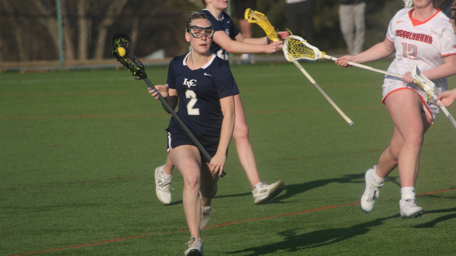 Annelise Vetter bringing ball up field