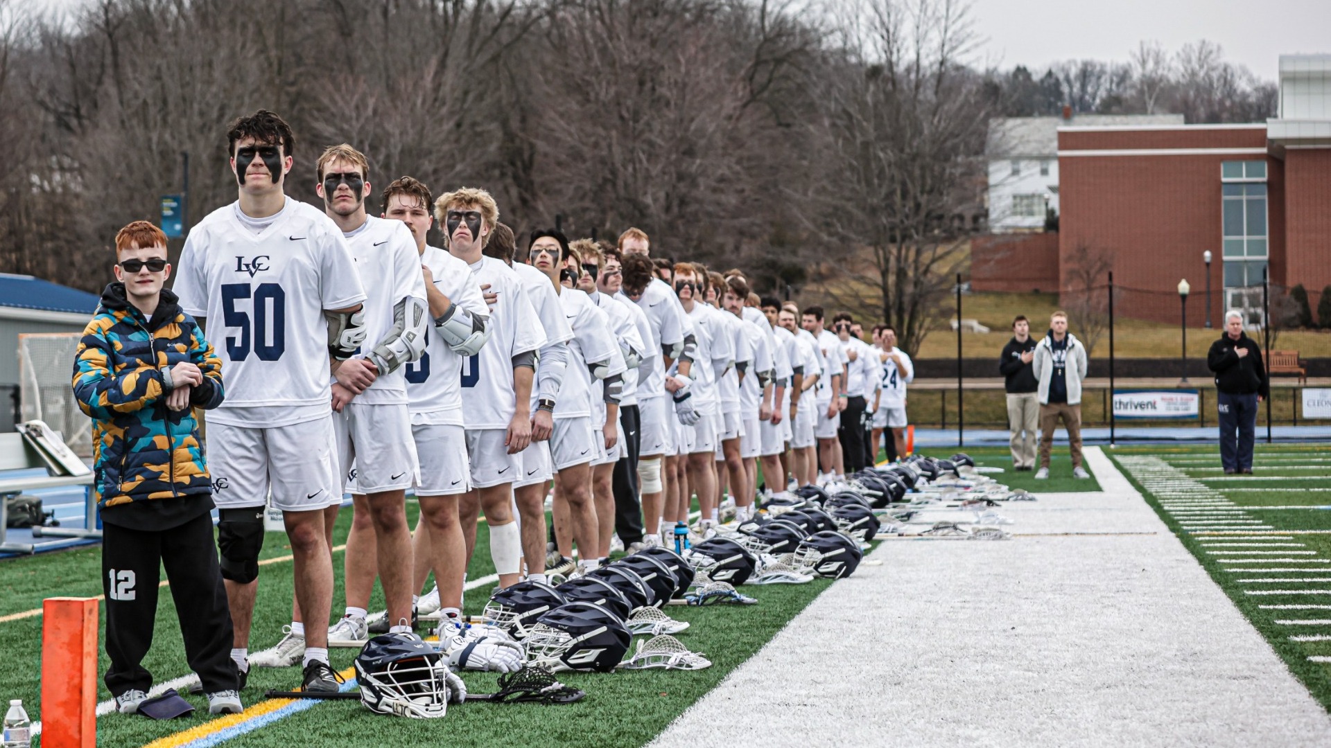 Men's Lacrosse team lined up for anthem 2026