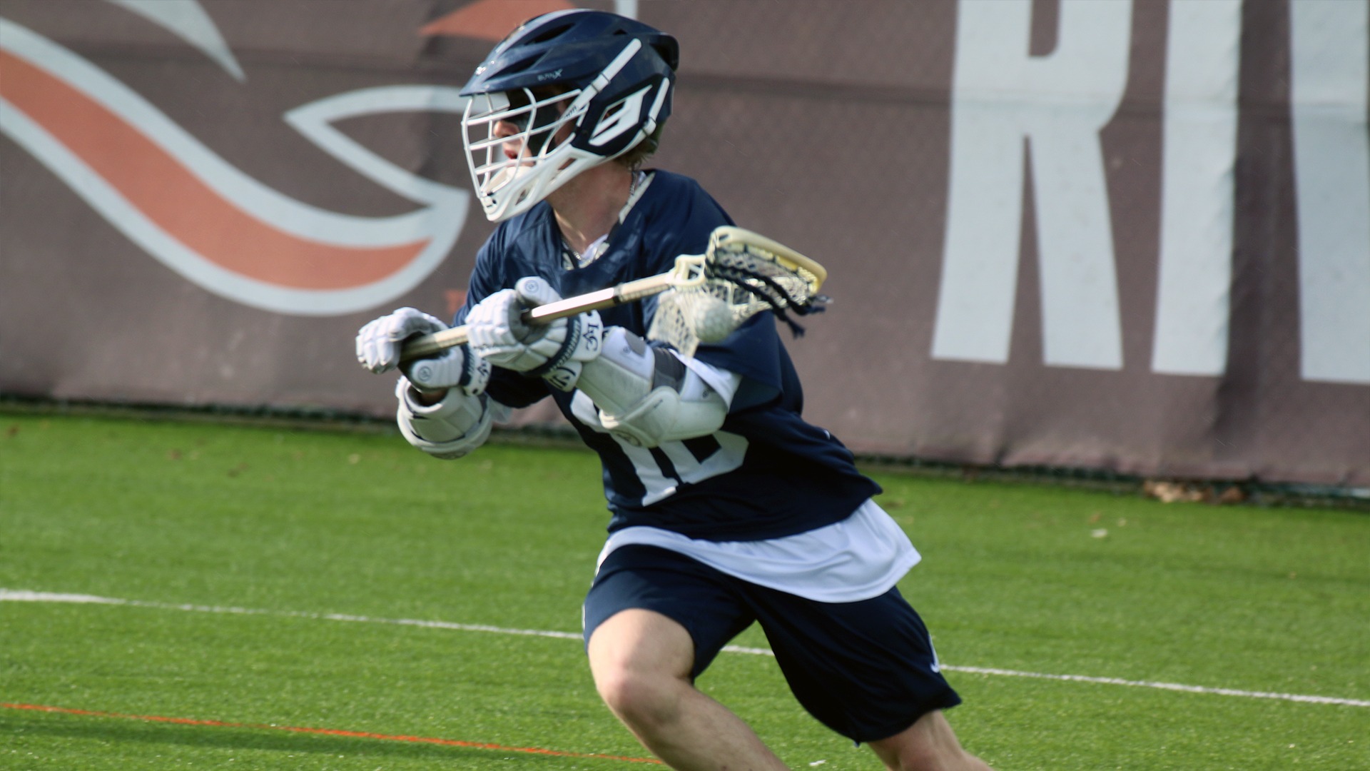 Ryan Grace with ball in stick looking to shoot