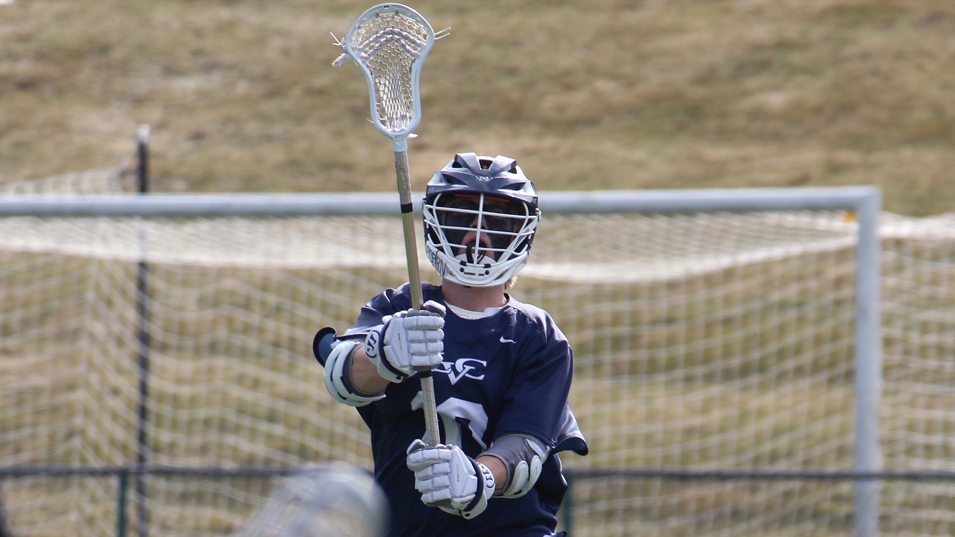 Hayden Carling holding stick ready to receive pass