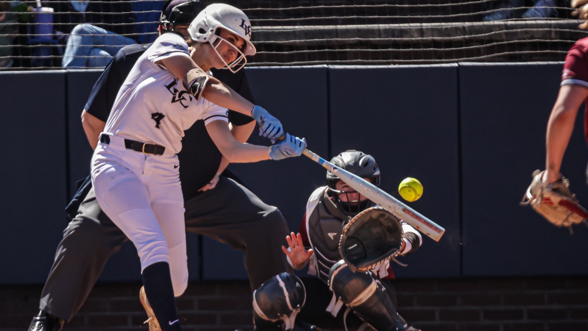Holly Grube hits a ball toward left field
