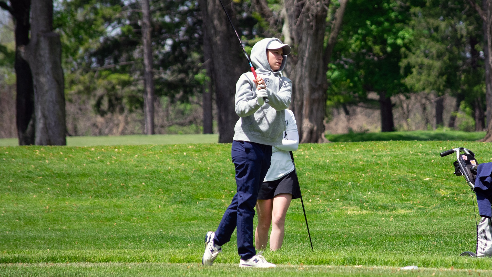 Jillian Fidler teeing off at MAC Championships