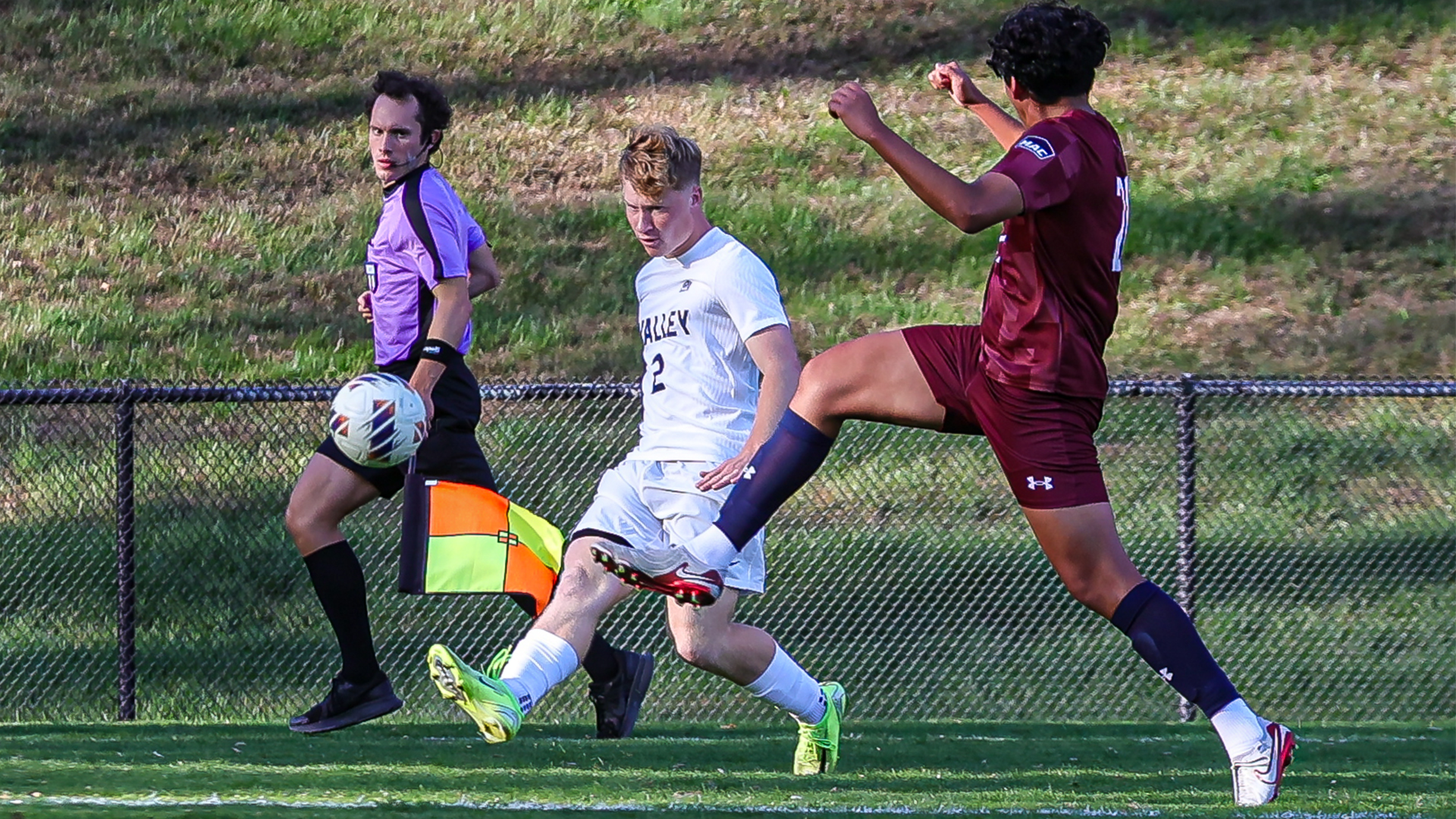 Jack Bowman passes the ball