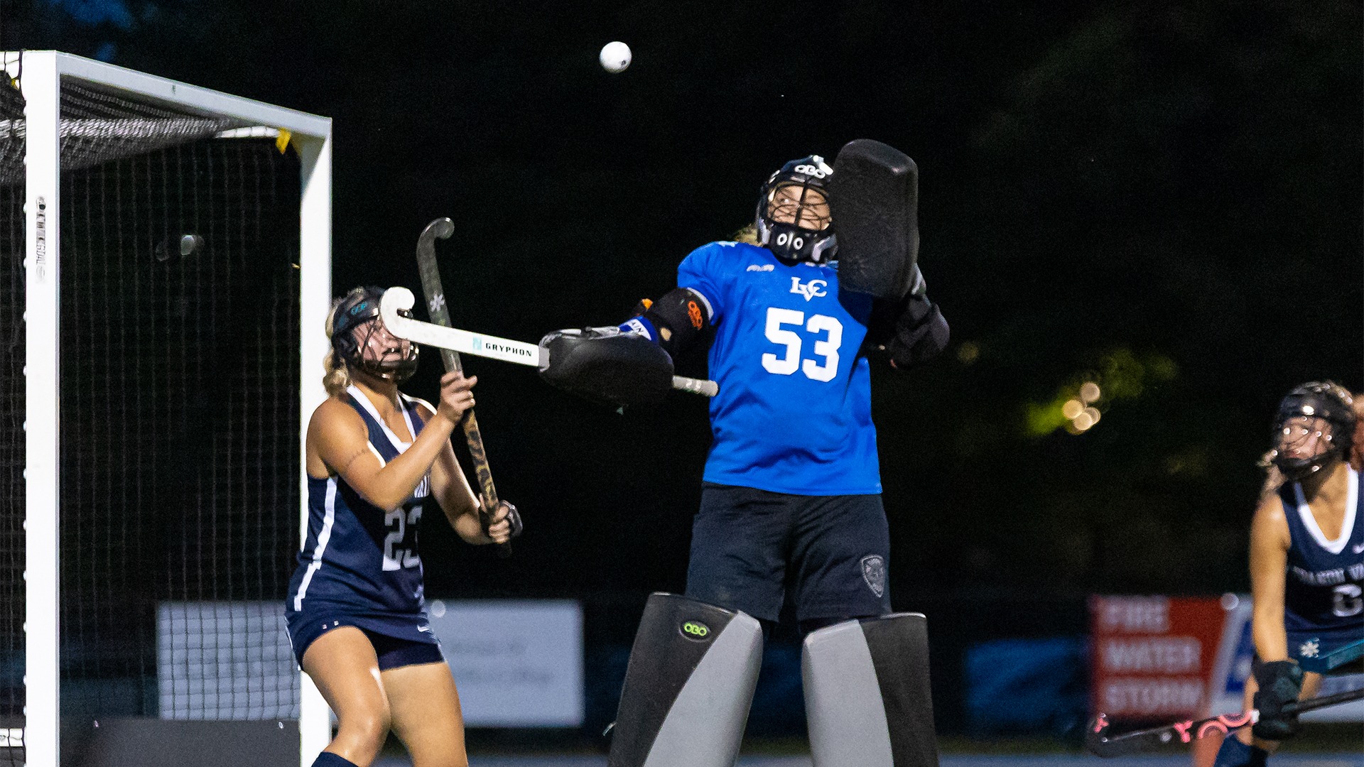 Ella Weidenhammer knocking the ball away 