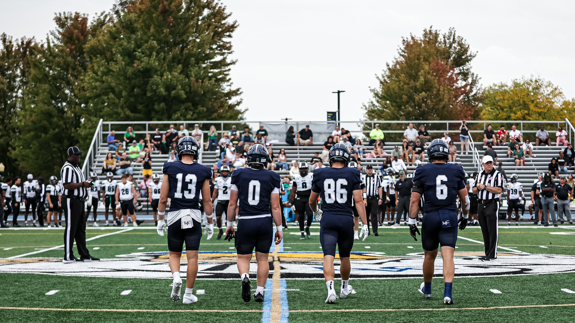 Football captains walk out to midfield