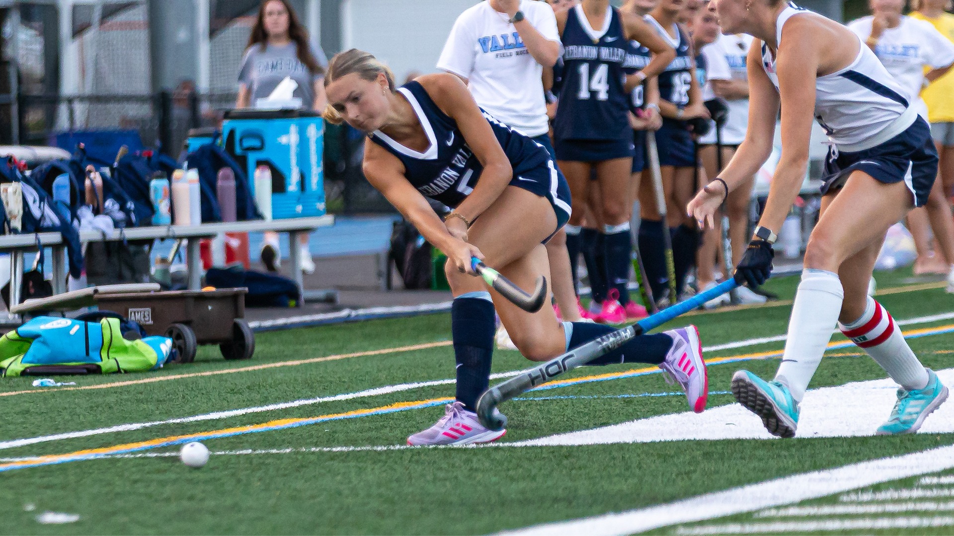 Lauren Foster passing the ball upfield