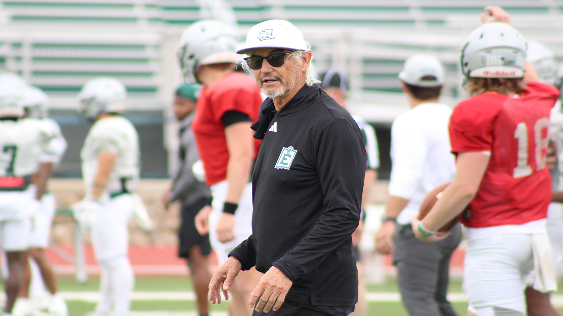 Art Briles walks amongst his players during a spring practice.