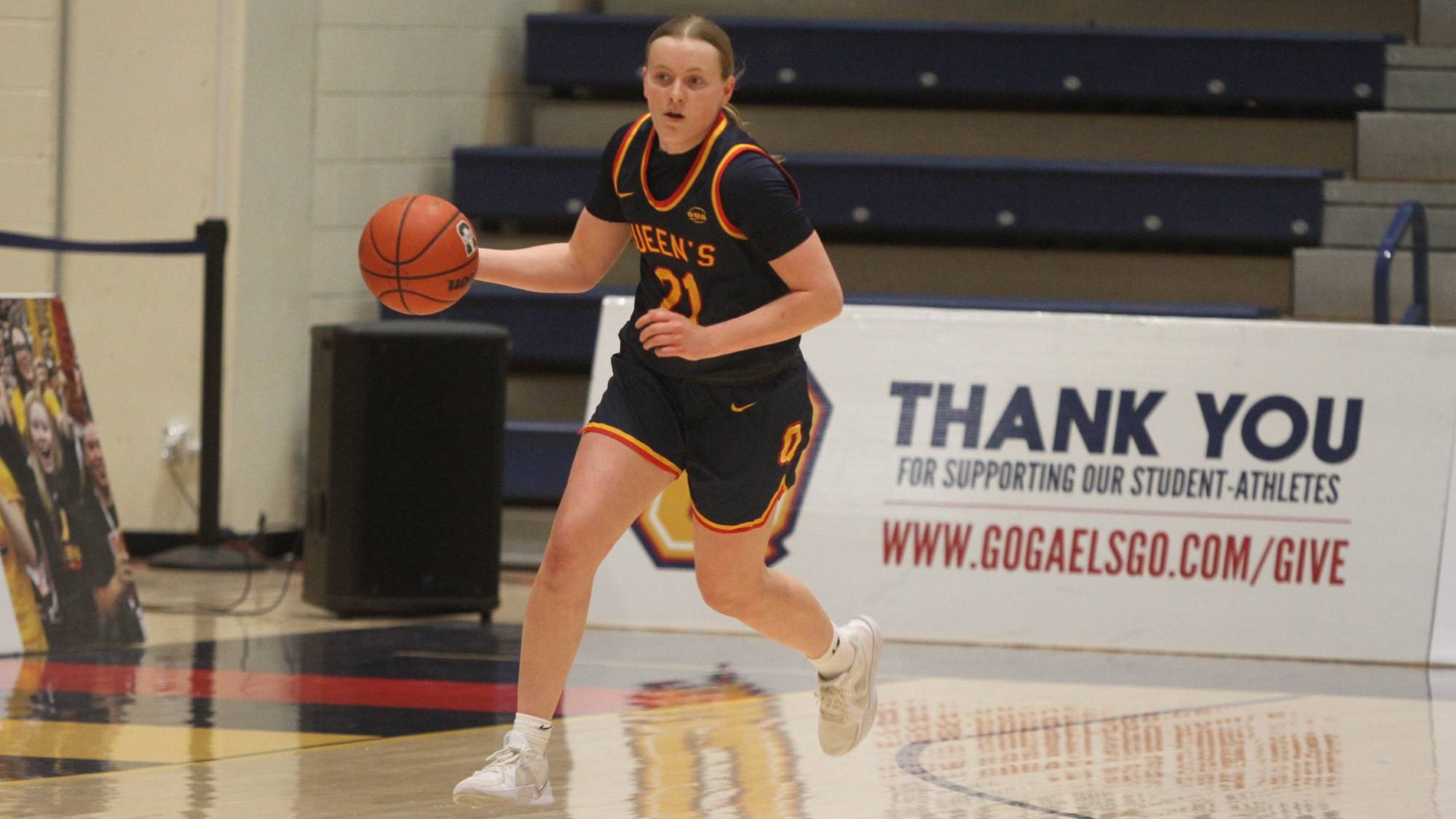 Brooke Hussey carries the ball up the court