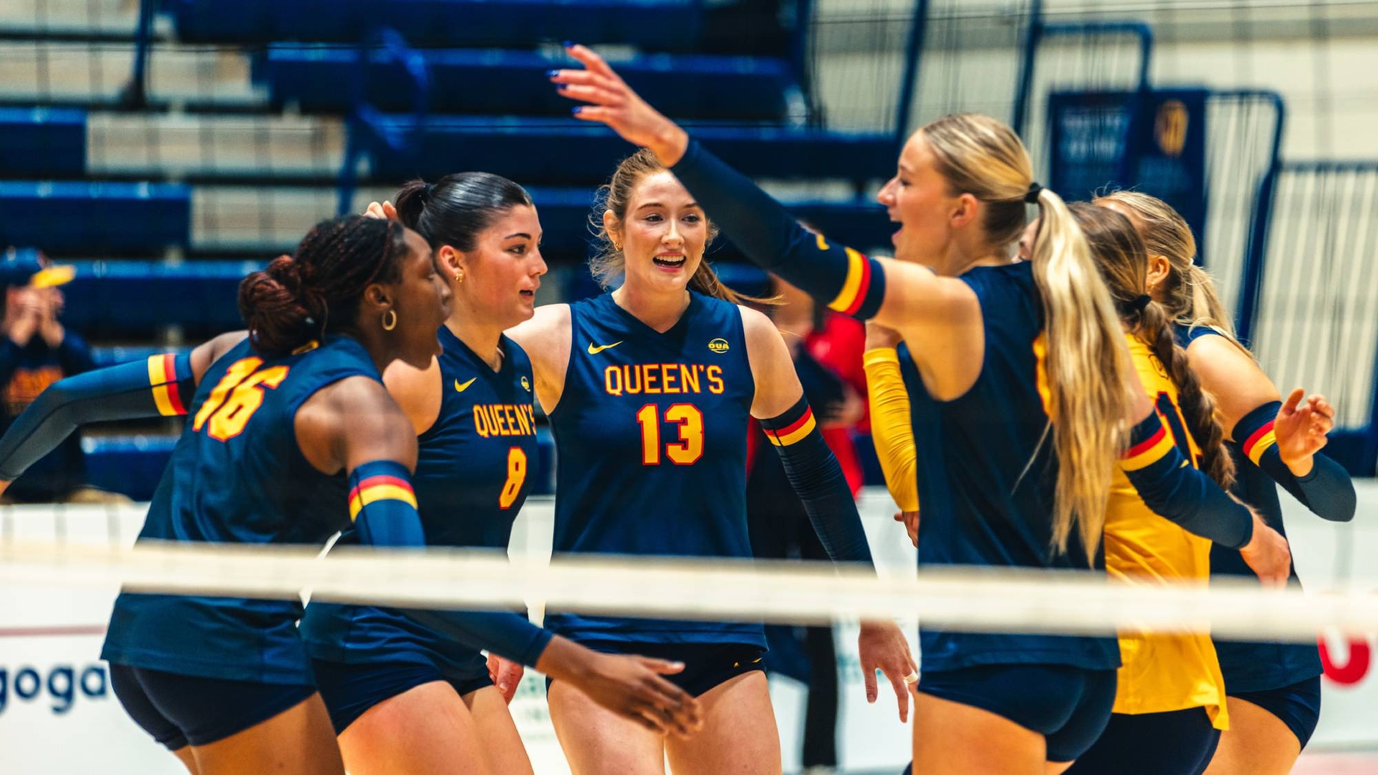 Abigail MacAlpine, Queen's Women's Volleyball celebrate