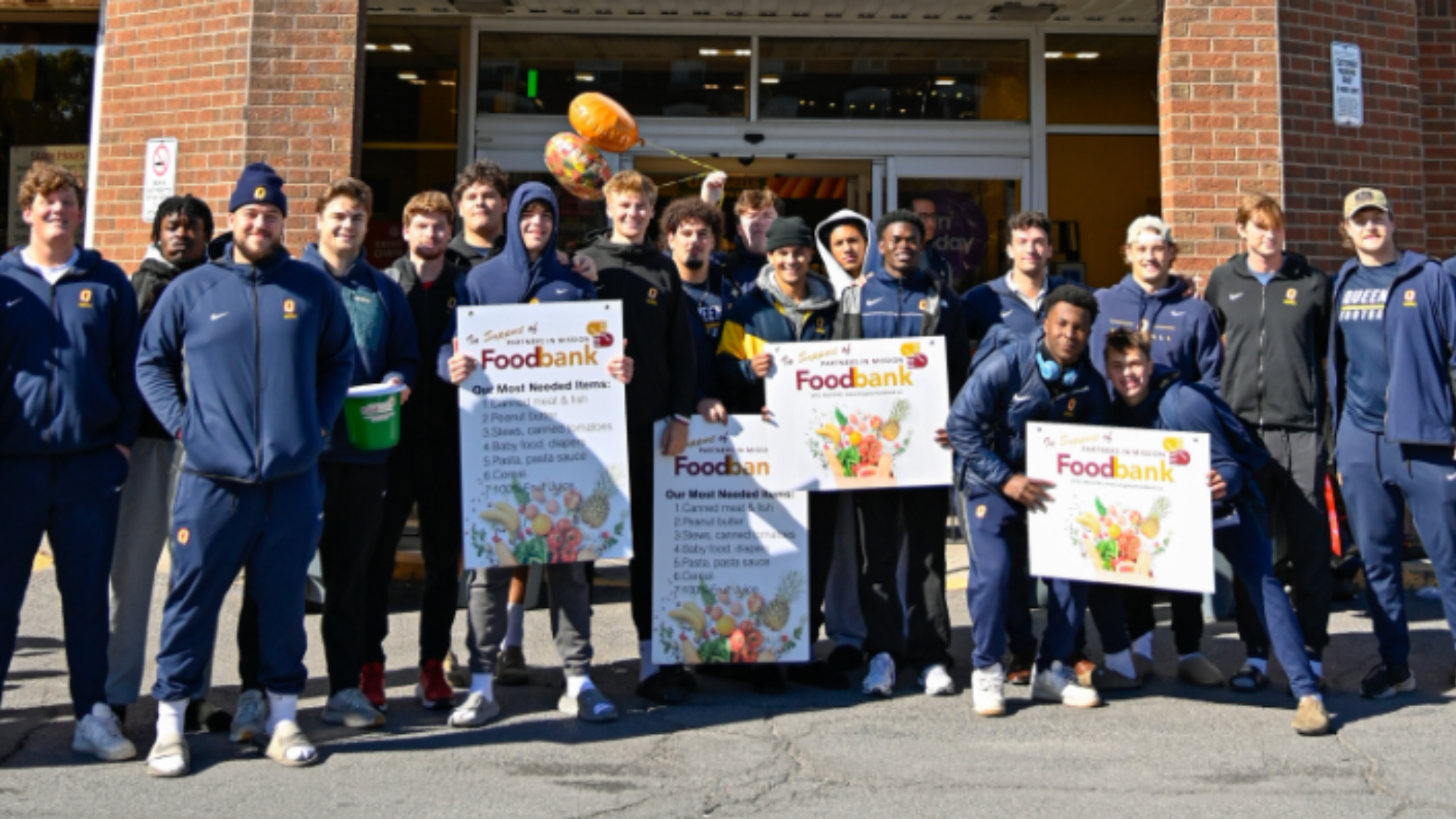 Queen's Football Tackle Hunger