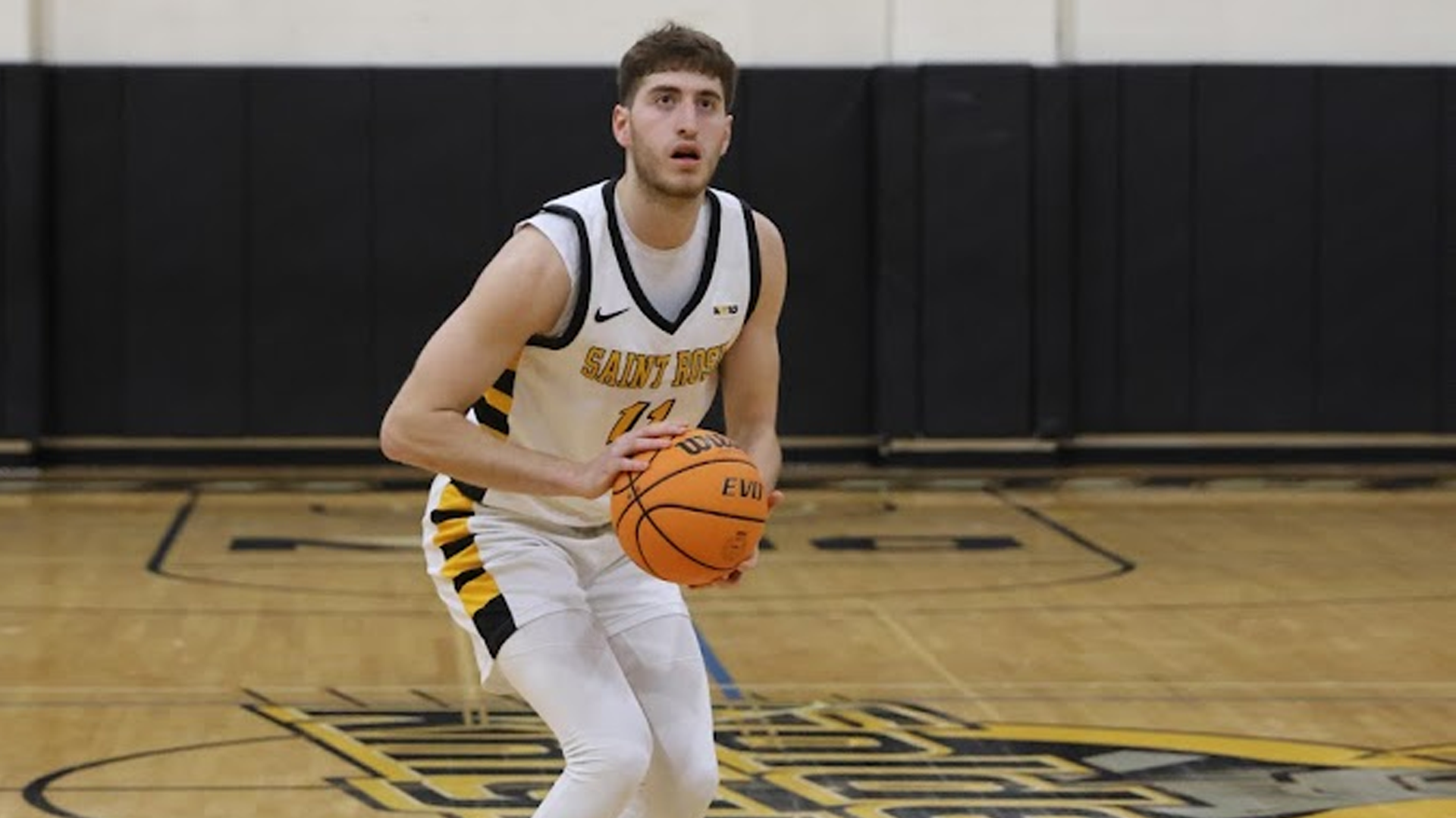 Ata Turgut of The College of Saint Rose men's basketball team in action against Queens on Wednesday, November 29, 2023 in Albany, New York