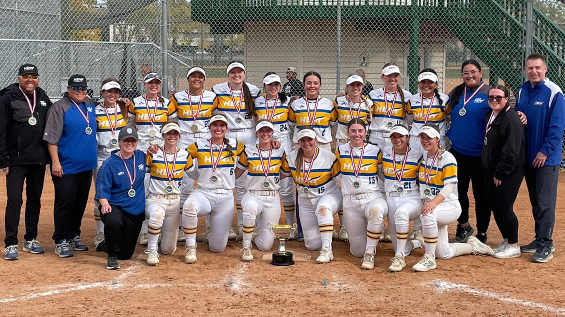 The UBCO Heat pose with their gold medals following their victory over the University of Saskatchewan in the WCSA Championship game.