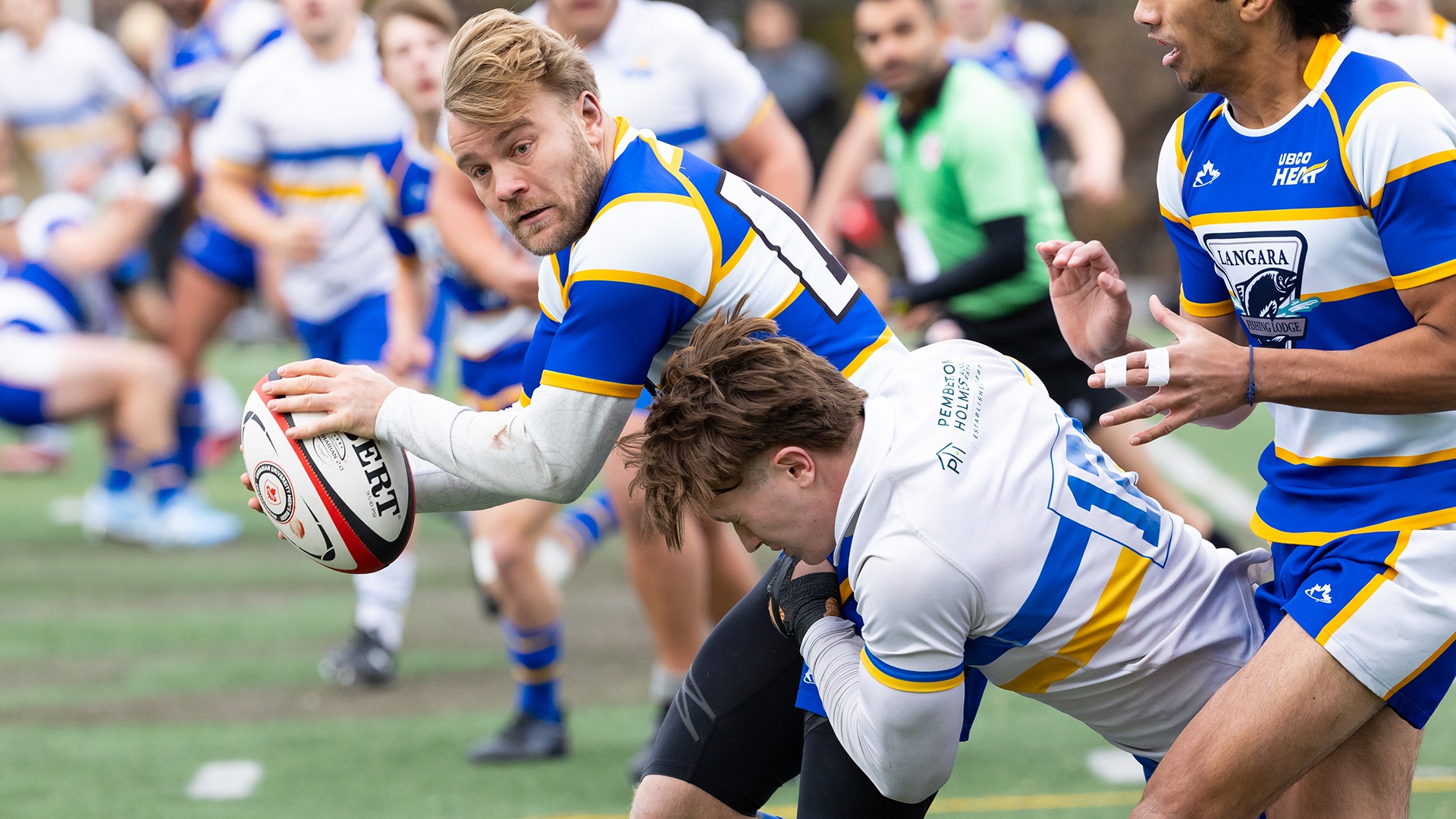 UBCO centre Jef Vreys is tackled during action against the Victoria Vikes during the CUMRC 5th Place Game in Ottawa