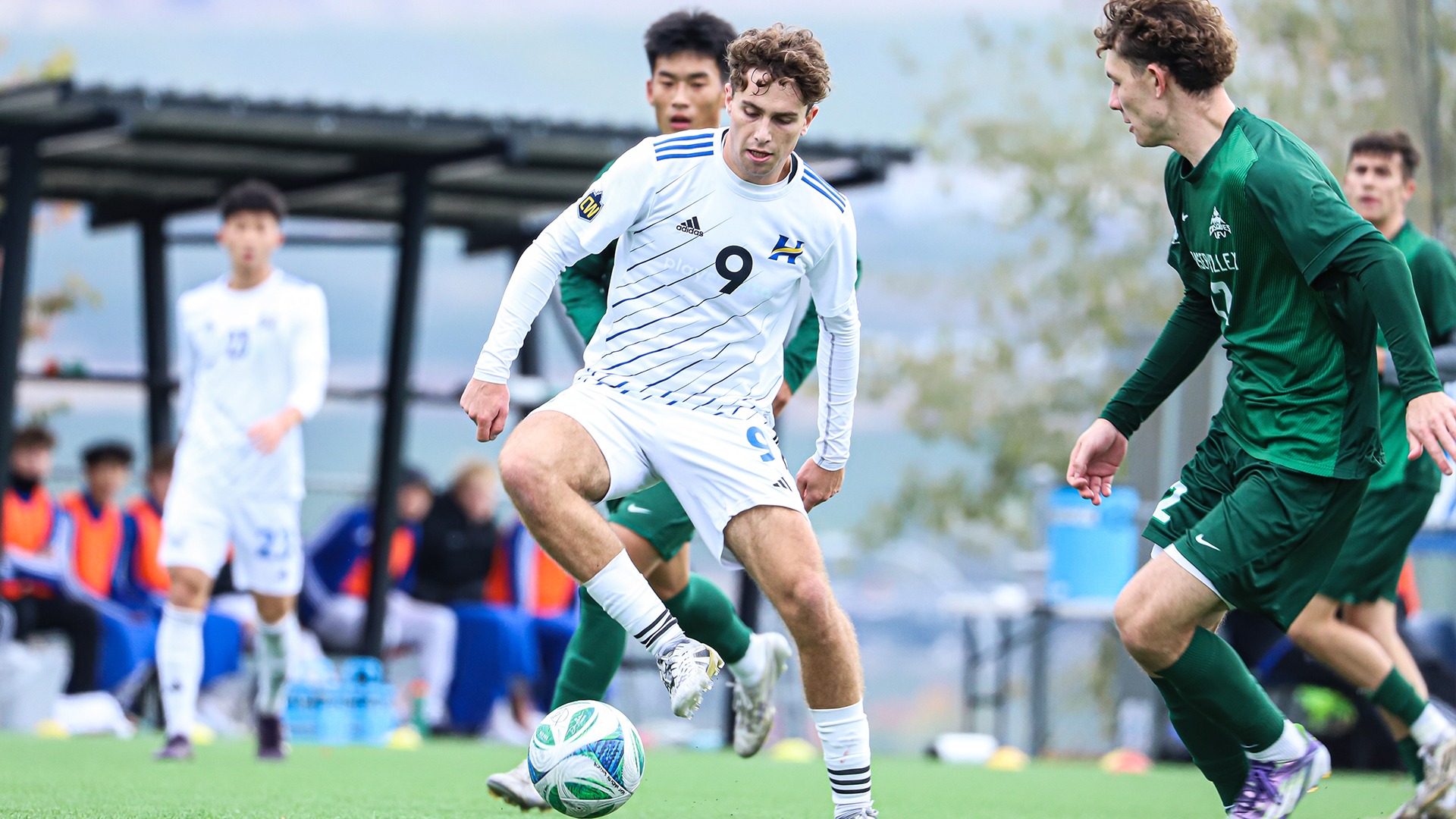 UBCO forward Oliver Deveau controls the ball against UFV defenders during action against the Cascades at Nonis Sports Field.