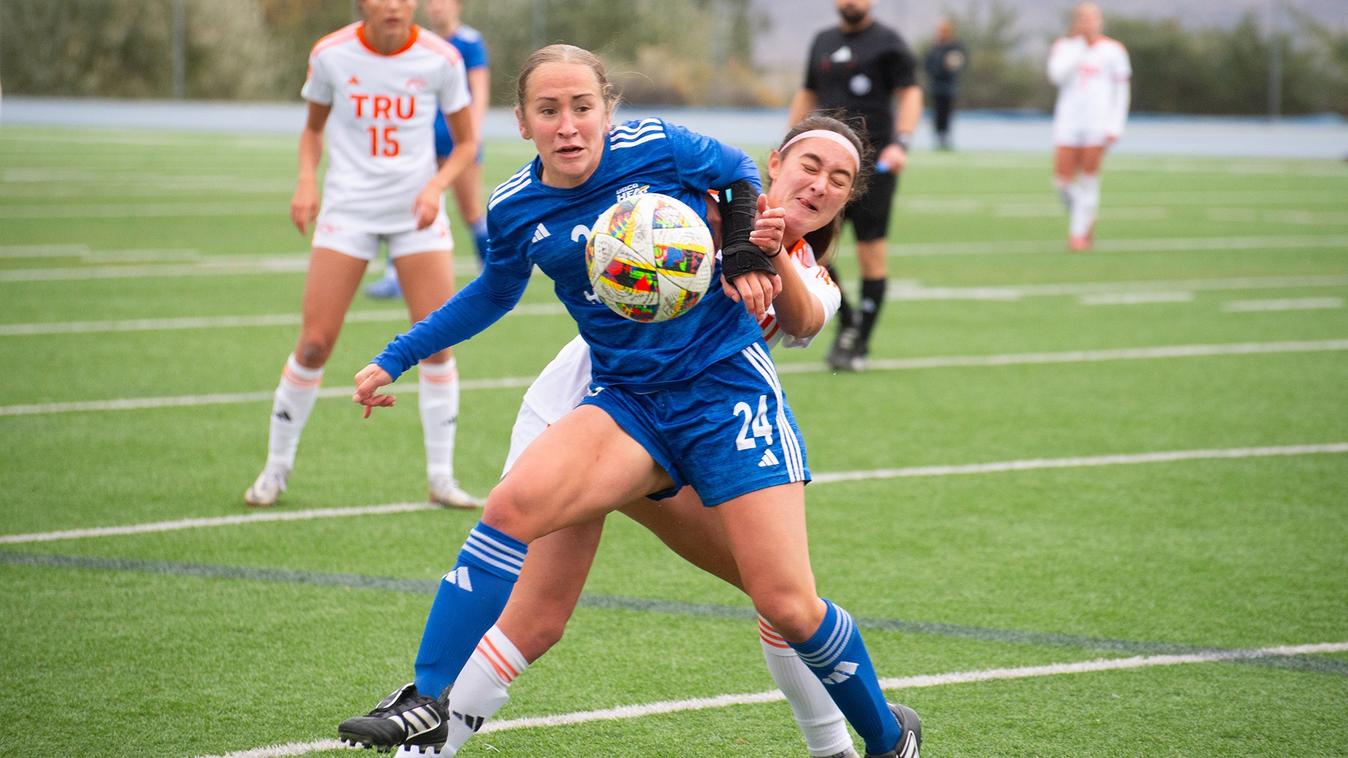 UBCO midfielder Annika Gross shields off a WolfPack defender during action against Thompson Rivers in Kamloops.
