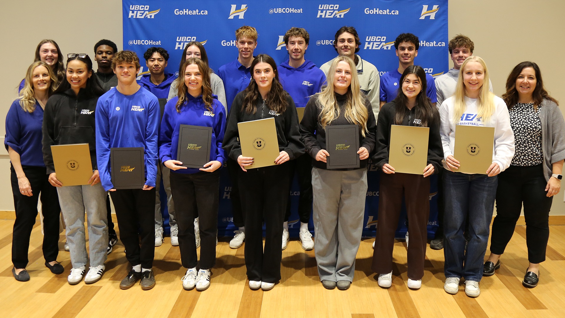 UBCO student-athletes from the Faculty of Health and Social Development pose with their Academic All-Canadian and Heat Scholar certificates during the department's annual breakfast in the UNC ballroom.