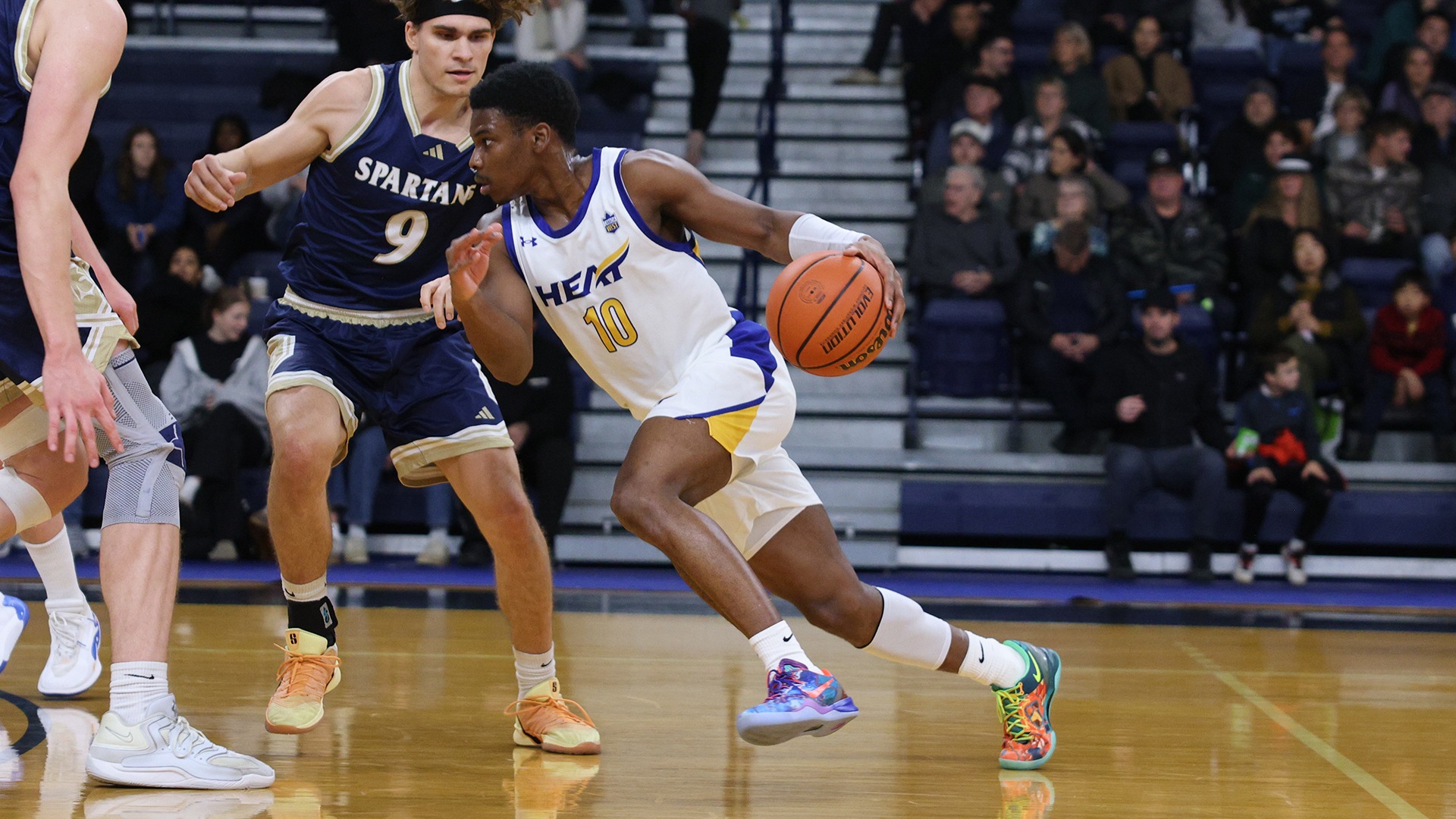 UBCO guard Jalen Shirley looks to drive past his defender during action against the Trinity Western Spartans in Langley.