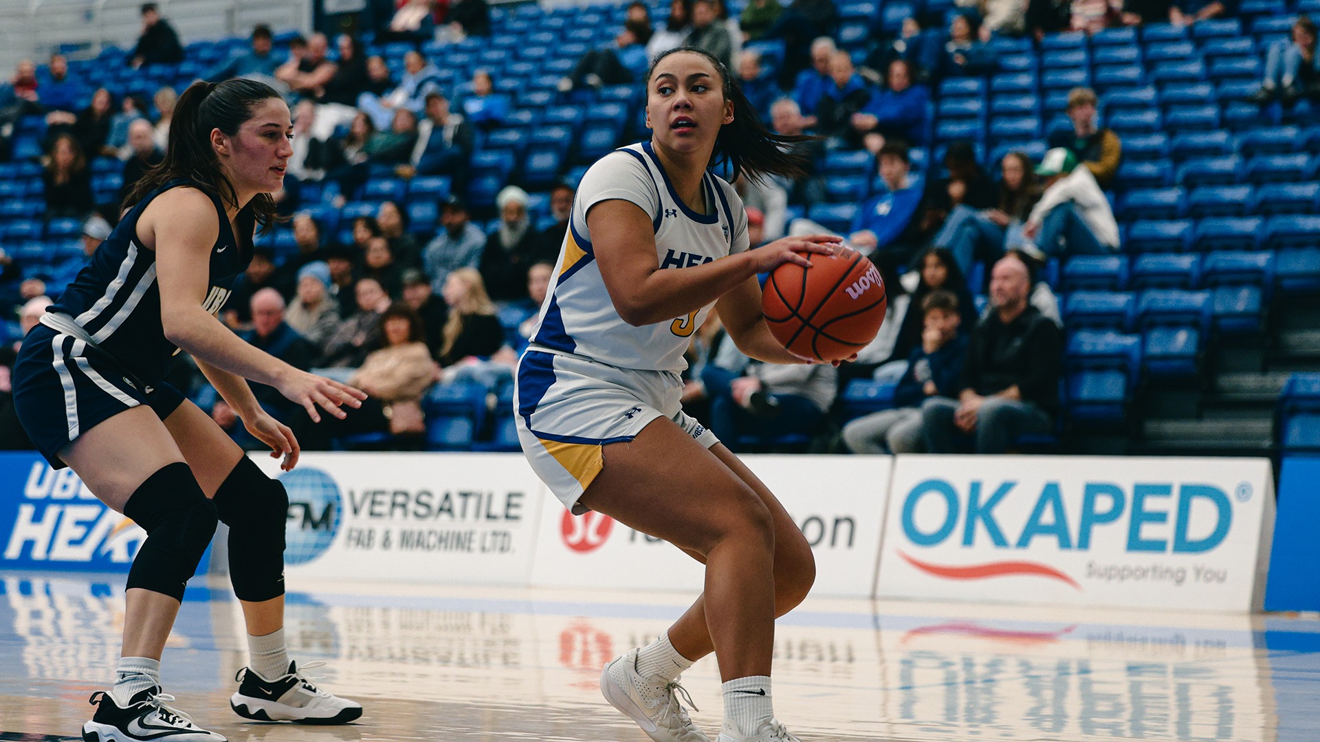 UBCO guard Aiko Williams turns away from her defender during action against the UBC Thunderbirds at the UBCO Gymnasium.