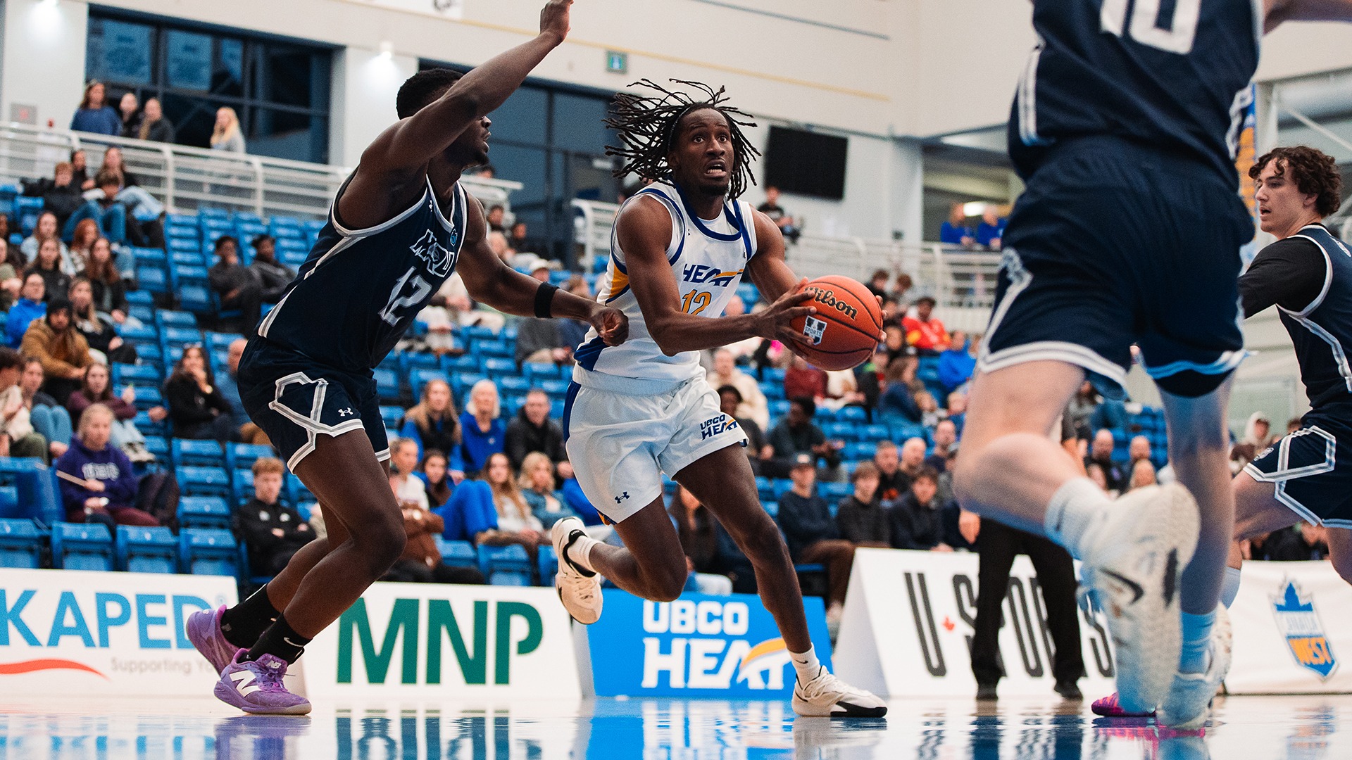 UBCO guard Lamine Conde drives into the lane during action against the Mount Royal Cougars at the UBCO Gymnasium.