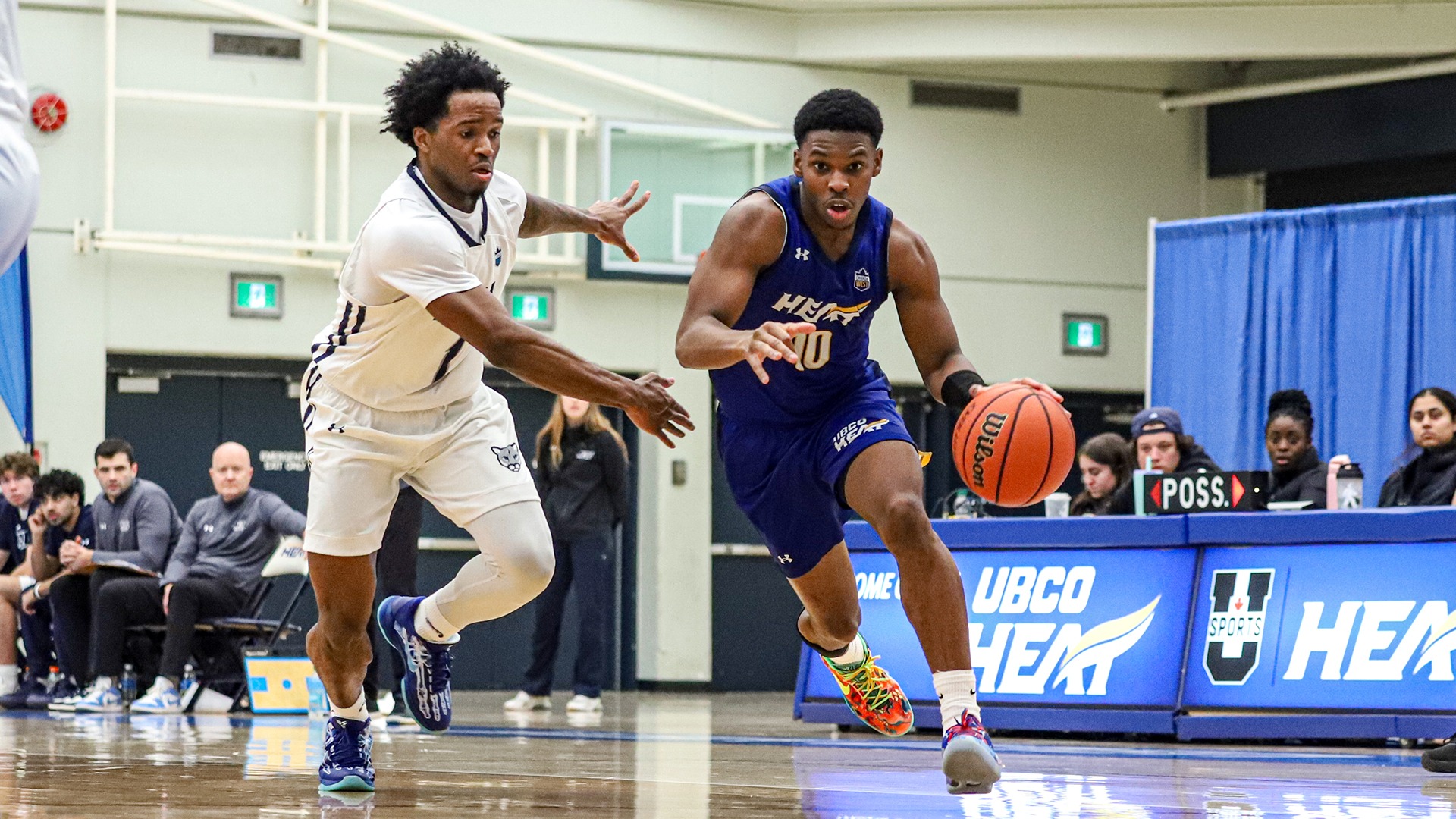 UBCO guard Jalen Shirley drives past his defender during action against the Mount Royal Cougars at the UBCO Gymnasium.