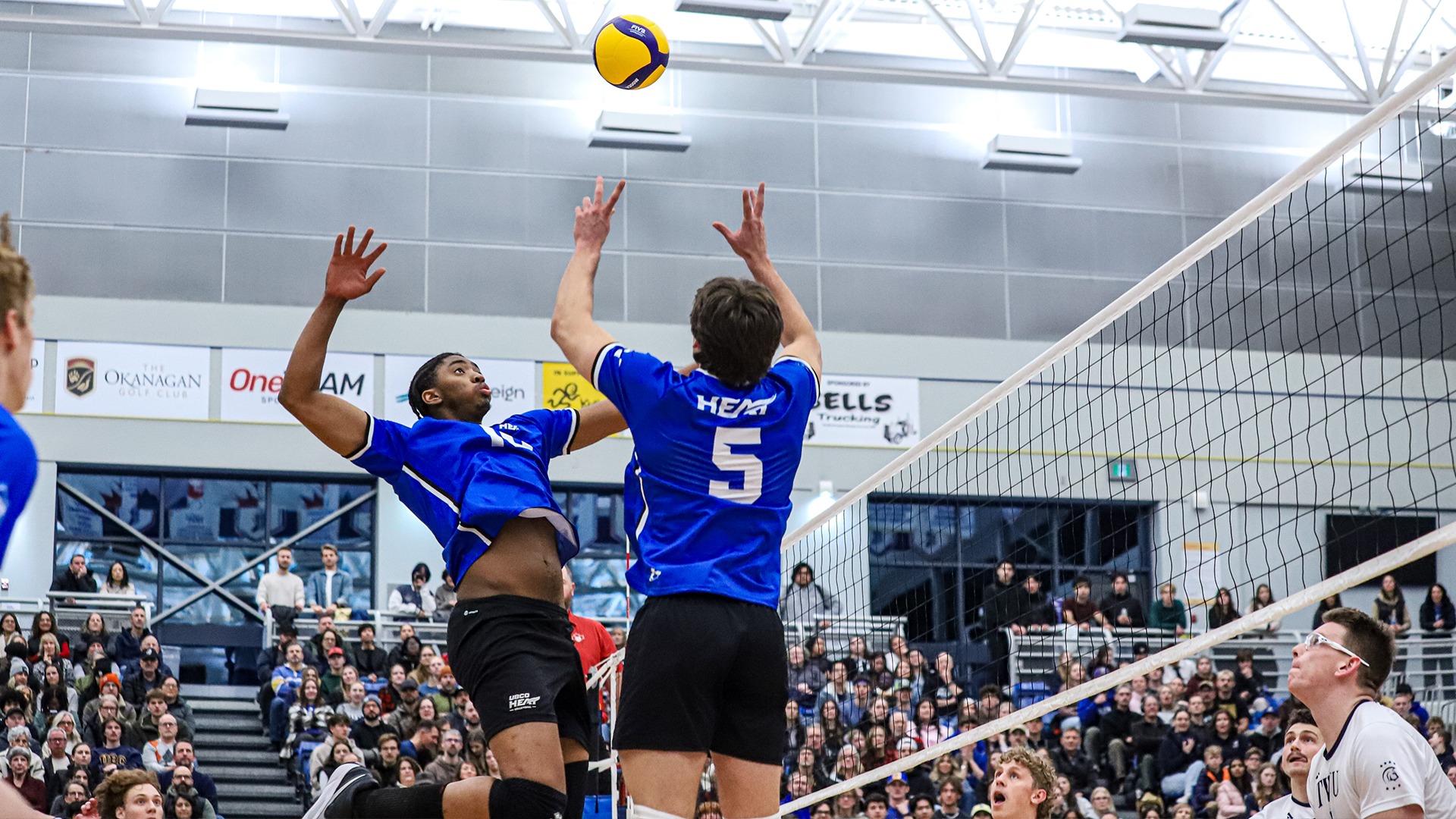 UBCO middle Ashton South rises for an attack during action against the Trinity Western Spartans at the UBCO Gymnasium.