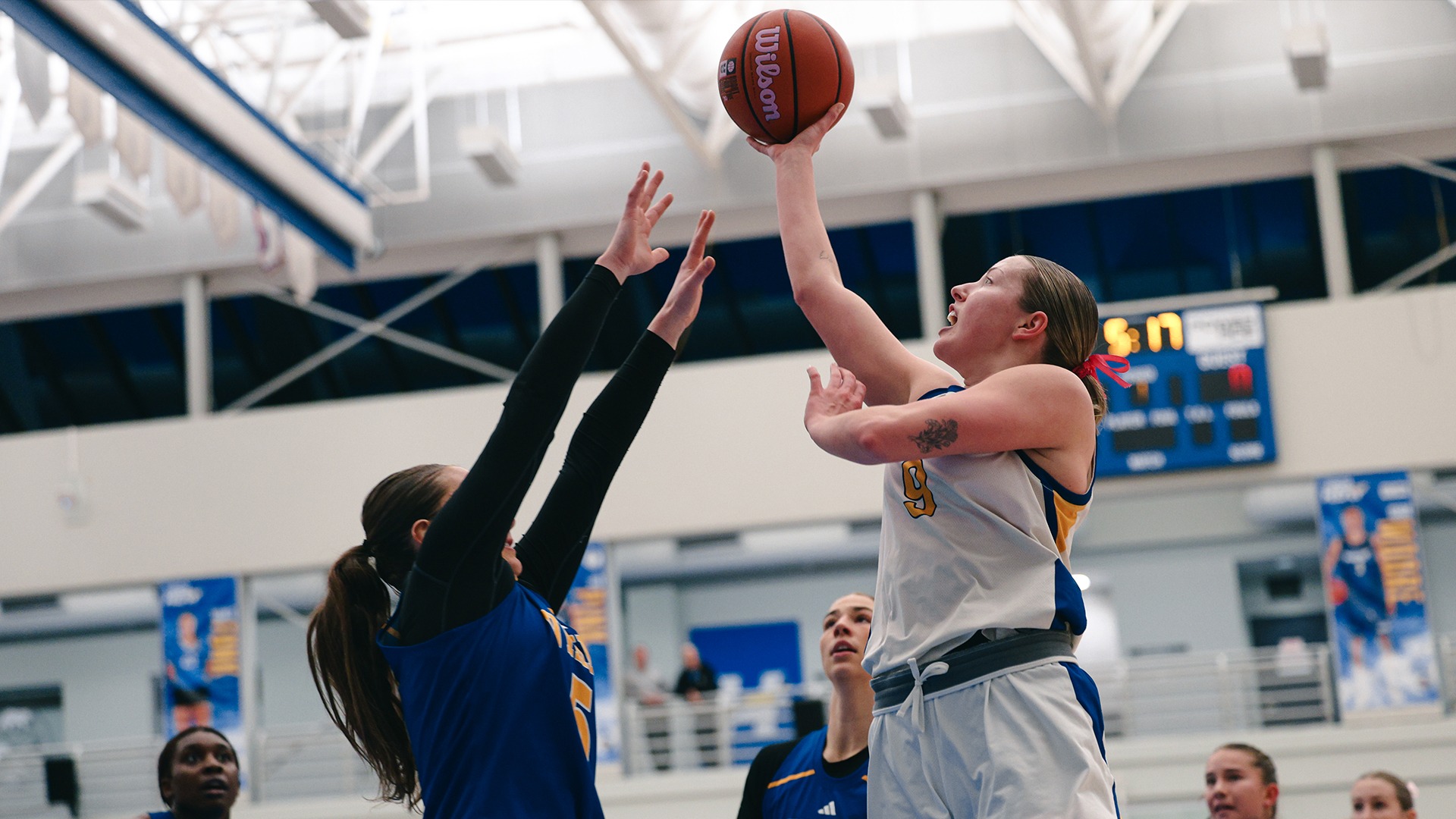 UBCO guard Lily Pink rises for a shot during action against the Victoria Vikes at the UBCO Gymnasium.