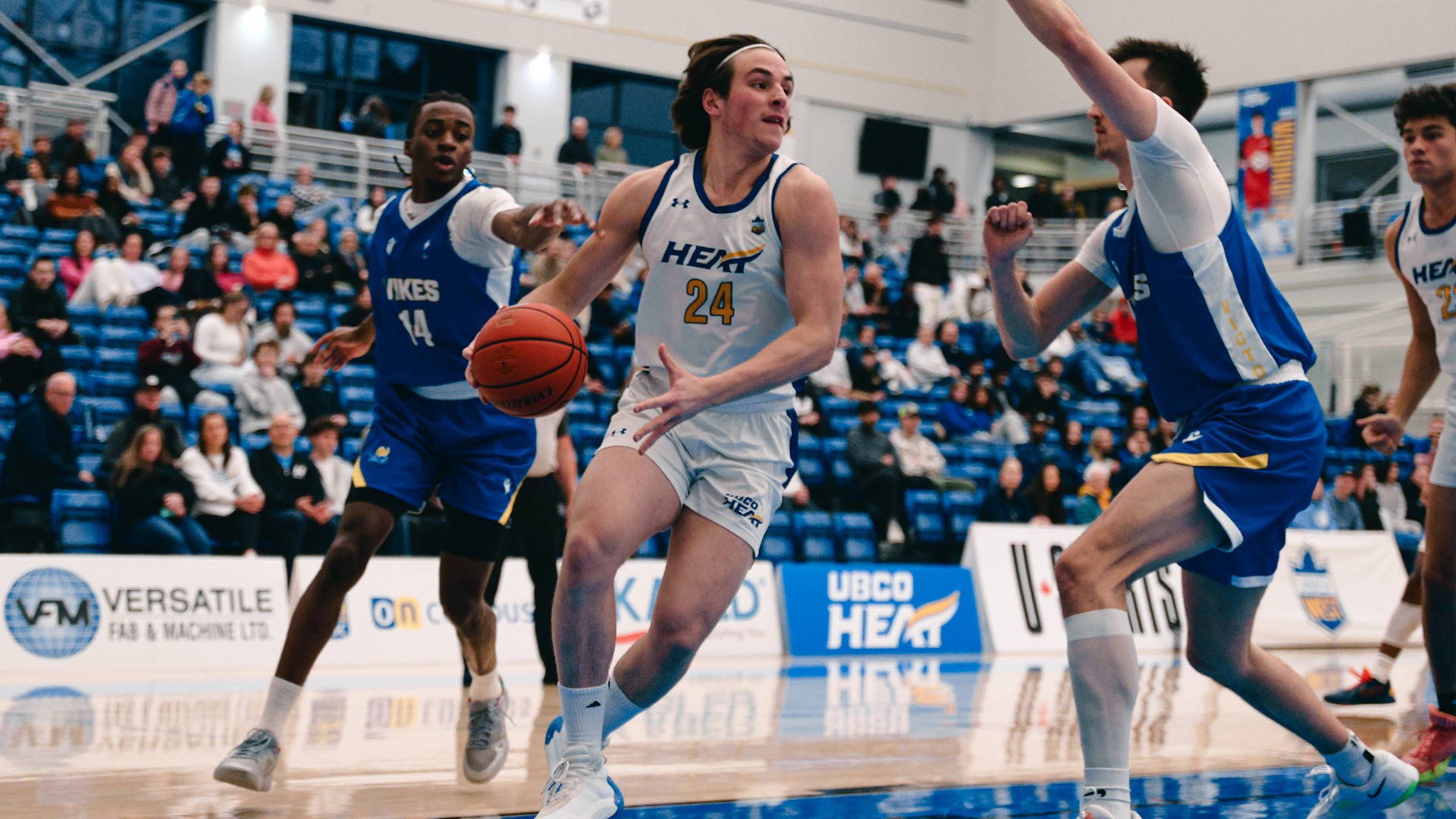 UBCO forward Mathias Schertzer drives to the basket during action against the Victoria Vikes at the UBCO Gymnasium.