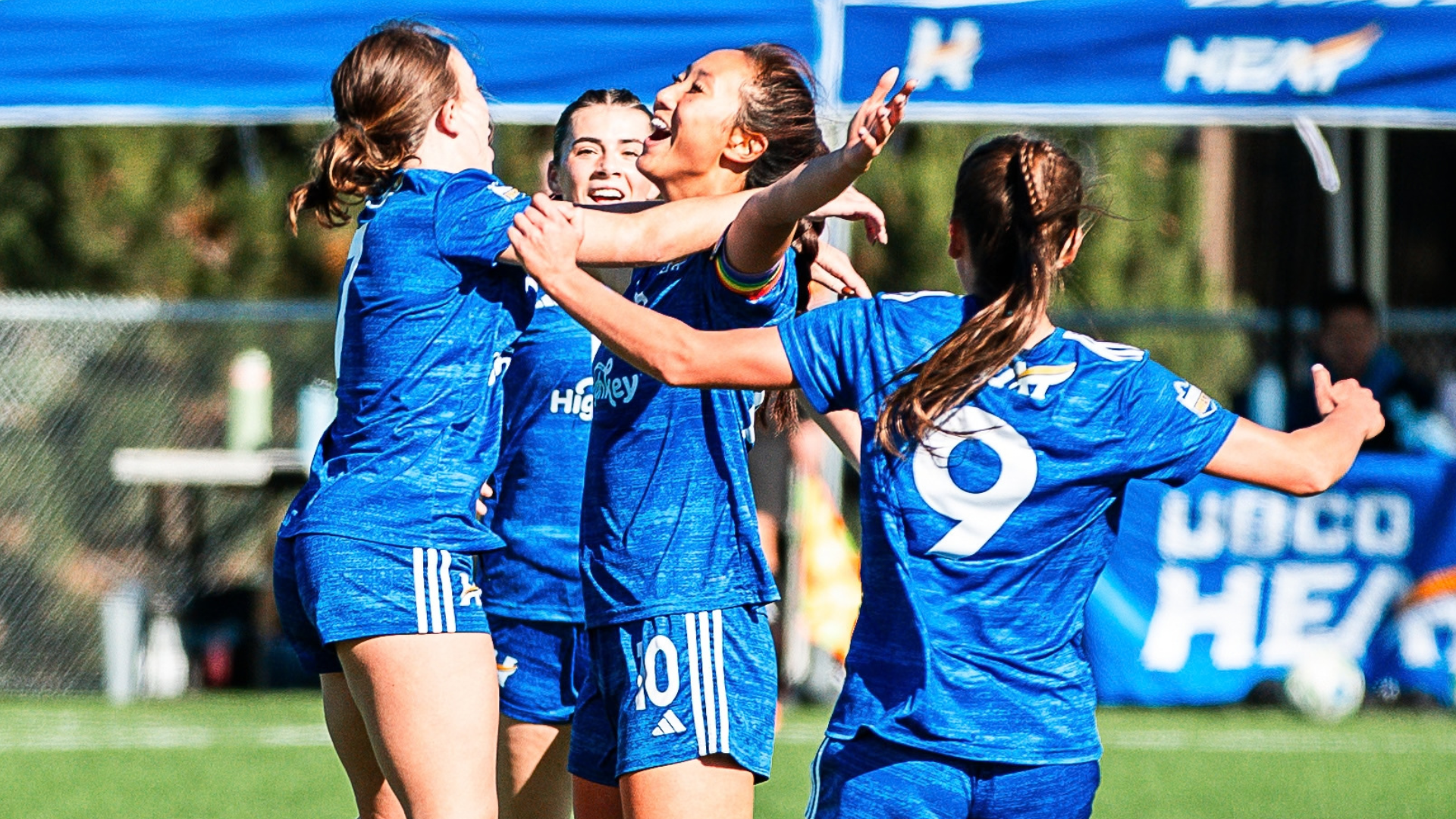 Megan sun of the UBCO Heat womens soccer team celebrates with her teammates after scoring against the UFV cascades