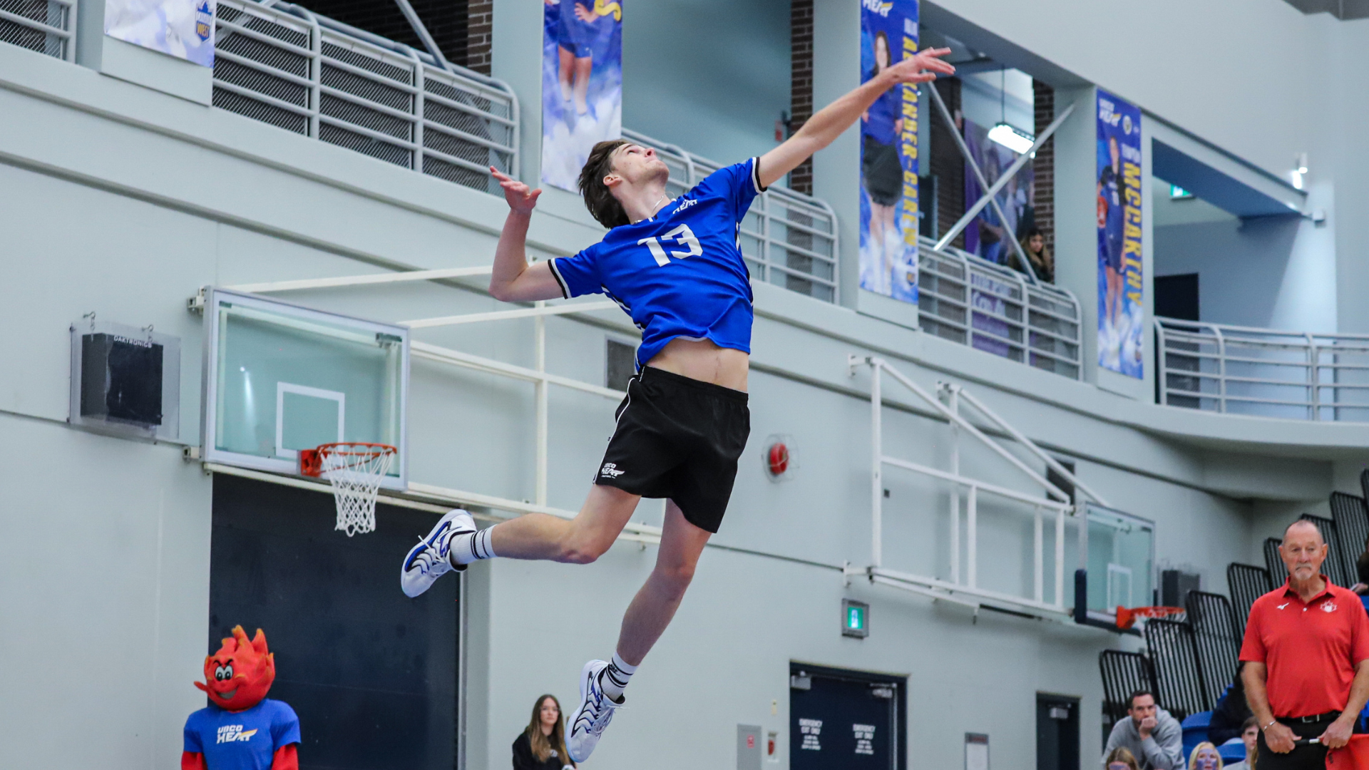 Thys Westrate going up for a spin serve attack to start the play