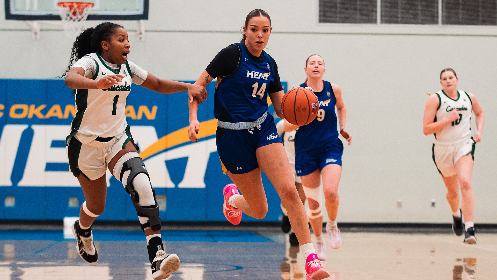 UBCO guard Kanani Coon drives past her defender during action against the UFV Cascades at the UBCO Gymnasium.